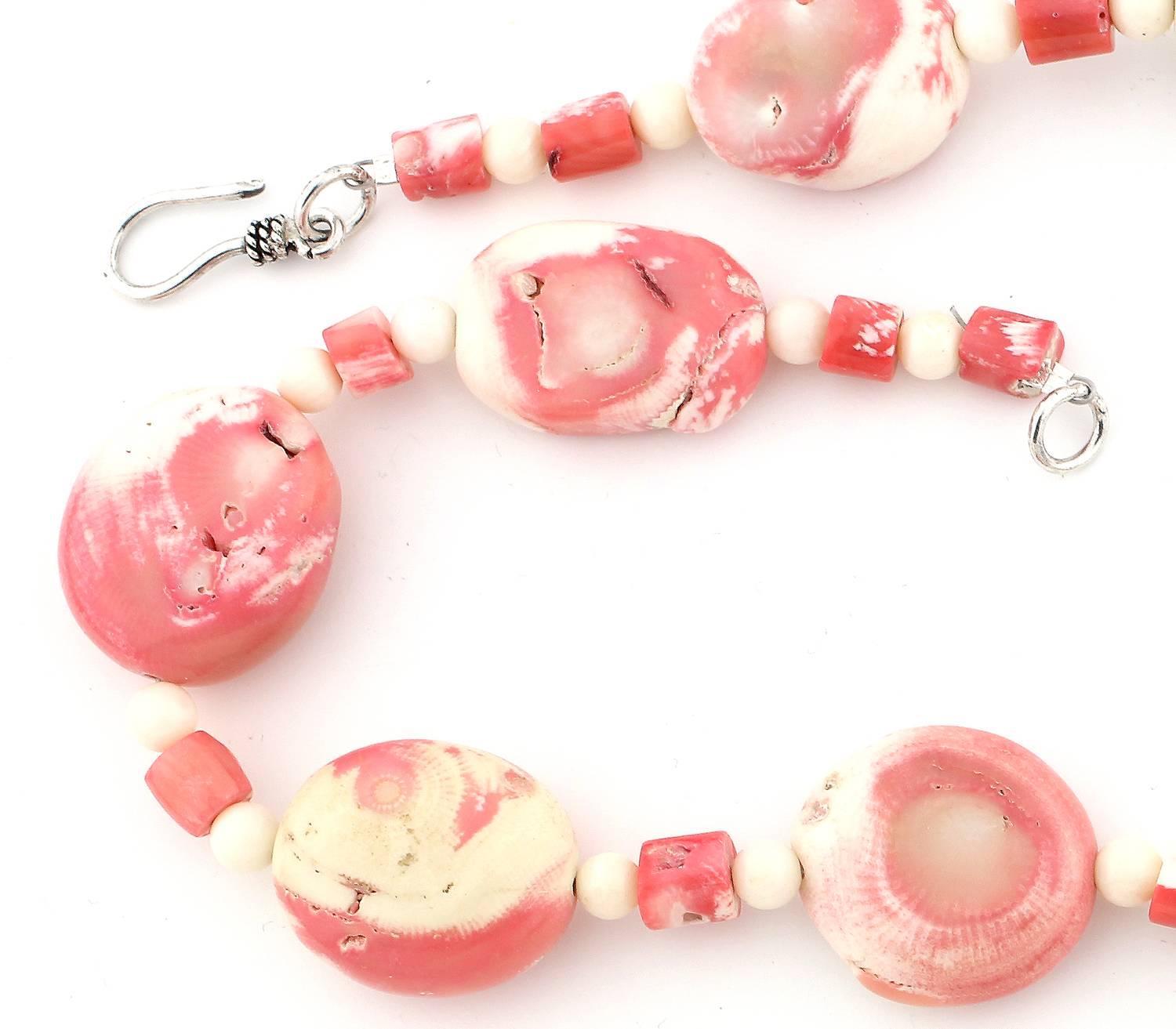 Slightly graduated pink and white crude polished bamboo Coral enhanced with smaller white and pink and white bamboo Coral with orangy pinky bamboo Coral pendant.
Size: This handmade pendant is 3 inches and largest Oval Coral is 29 mm x 23 mm,