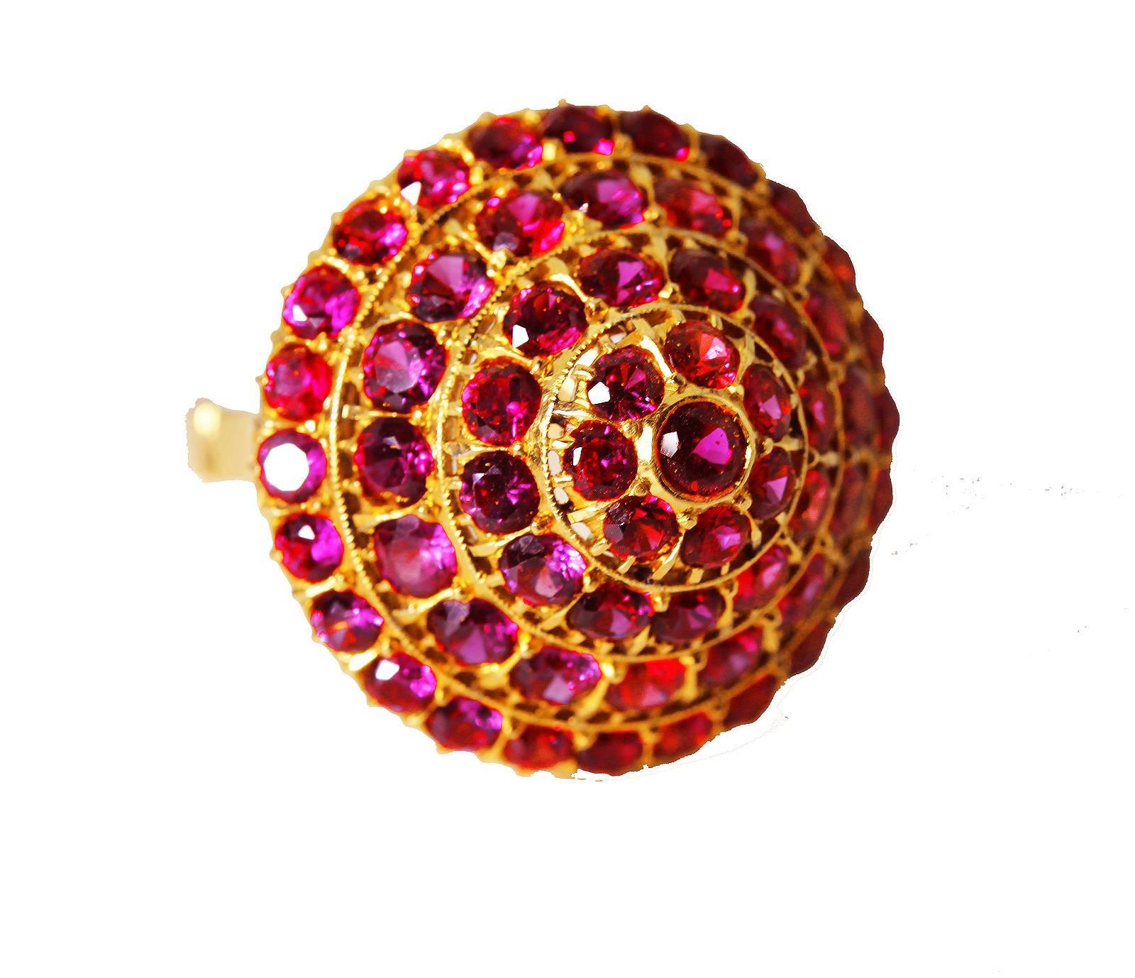 Glittering red Ruby gold bombe ring of 14 KT yellow gold.  These are natural red Burmese rubies. This is currently a size 8 due to the sizer on the ring.  Will leave the sizer on it for the sale or remove it for our Buyer if they prefer.  This