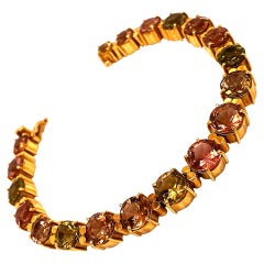 AJD Multi-Color Tourmaline 'Tennis Bracelet' and 18 Karat Yellow Gold Bracelet