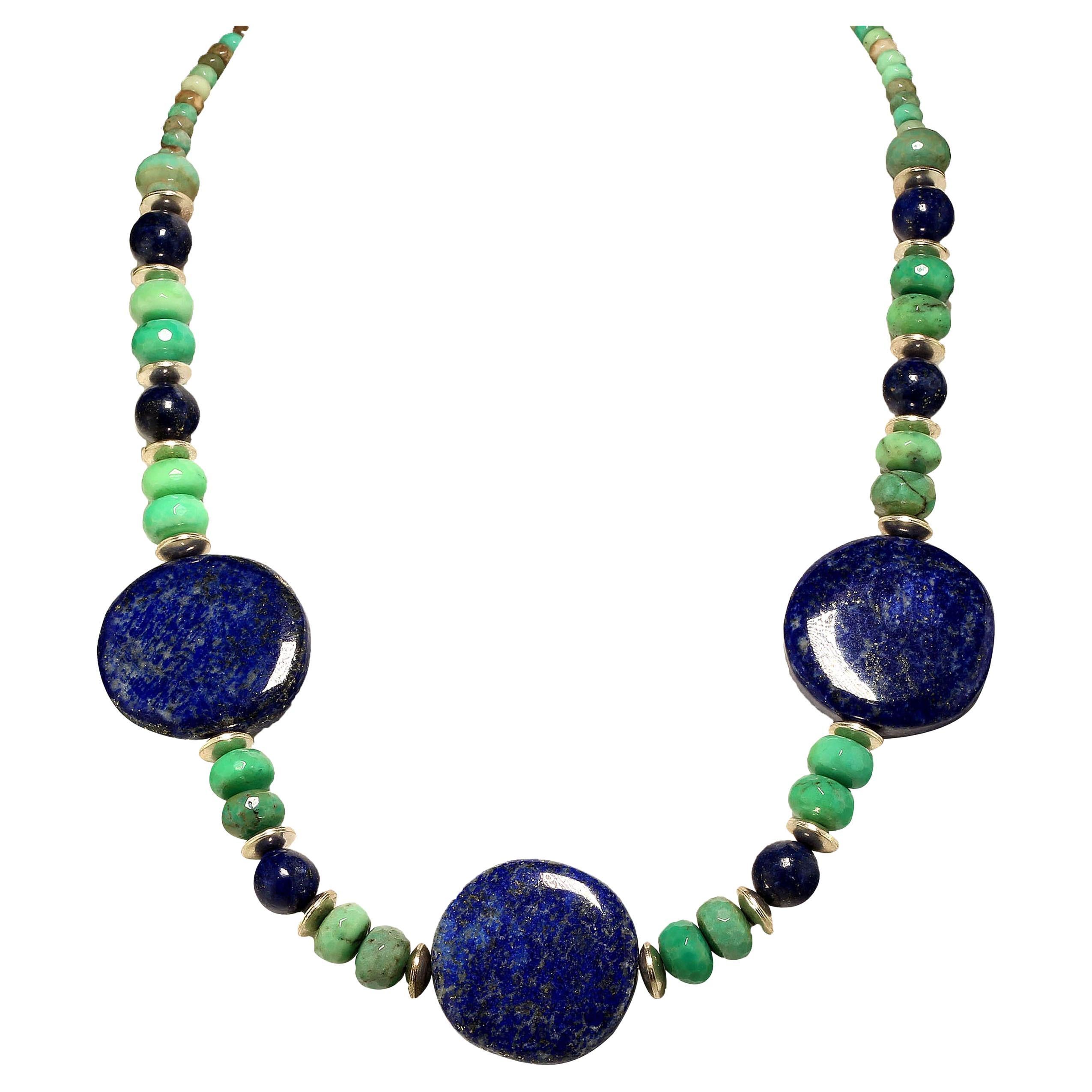 Stunning necklace of large, highly polished Lapis Lazuli Discs, average 37 MM, and 12 MM spheres of Lapis, and two sizes of Chrysophrase rondelles, all accented with silver tone rondelles. This necklace is 24 inches in length.