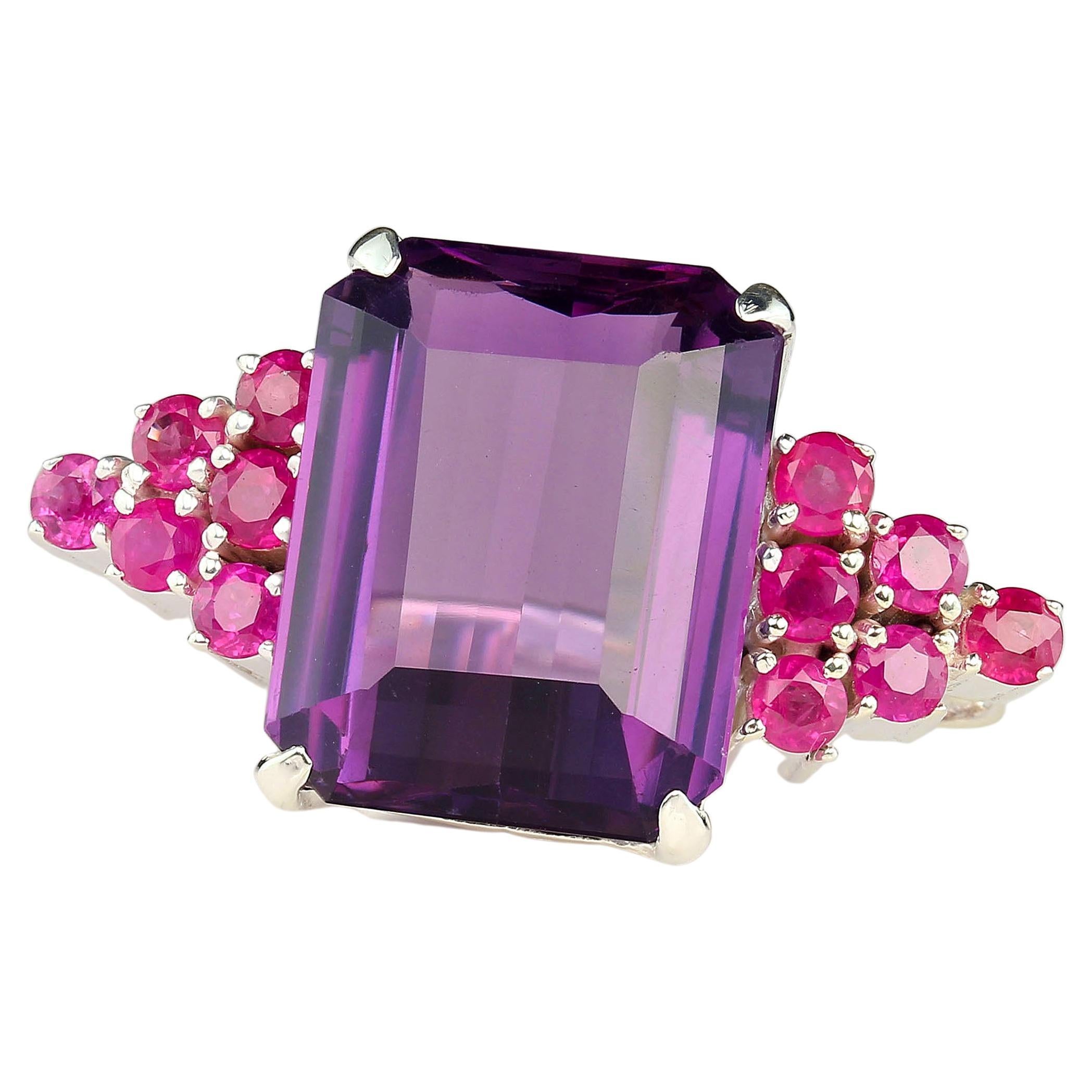 Cocktail dinner ring of sparkling square cut Amethyst and accented with stunning Pink Sapphires.  This bold ring features a 16.39 carat Amethyst and 12 round Pink Sapphires, 6 per side, 2.07ctw. This gorgeous ring is 1.25 inches side to side. It is