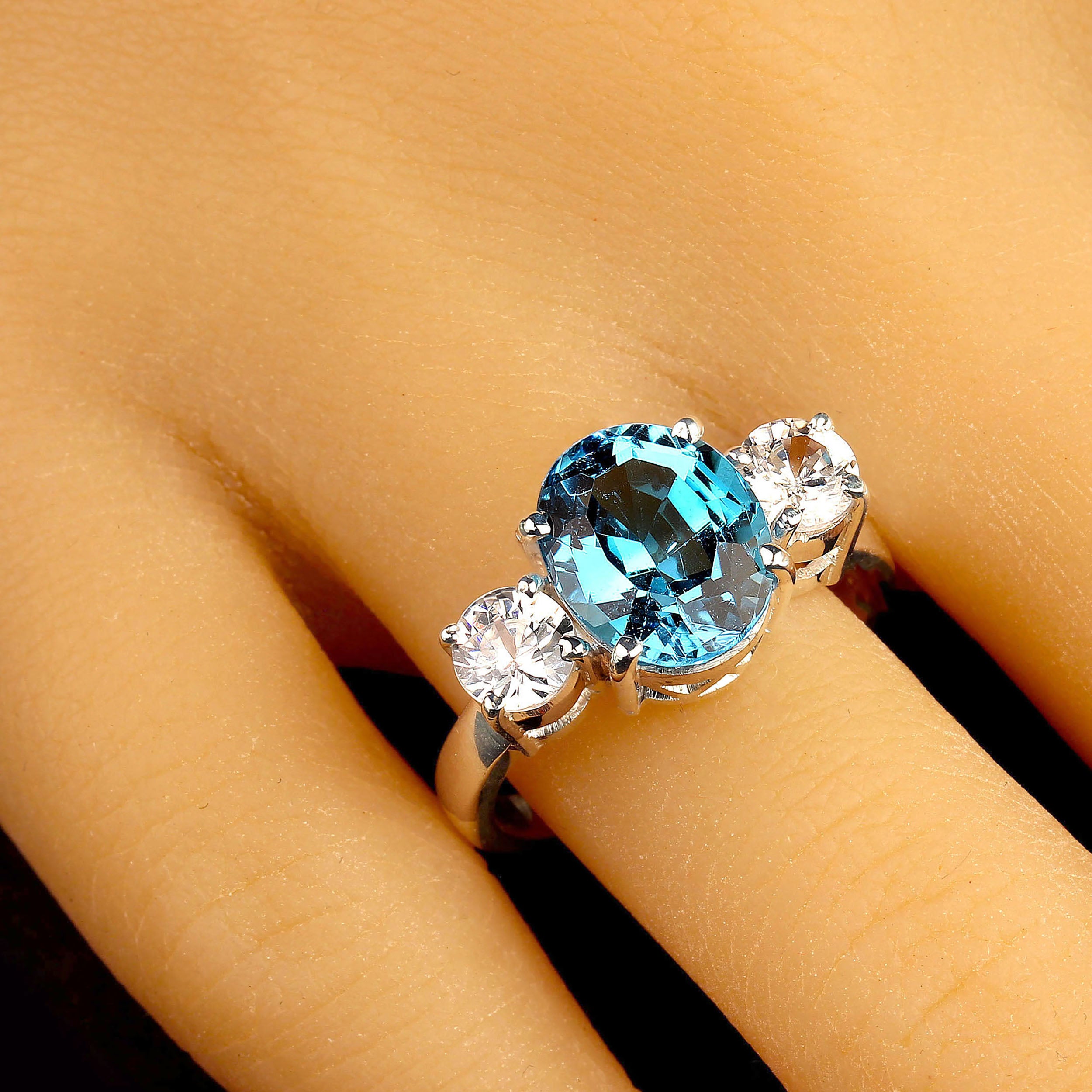 AJD Elegant Blue Topaz and Sparkling Genuine Zircon Ring For Sale
