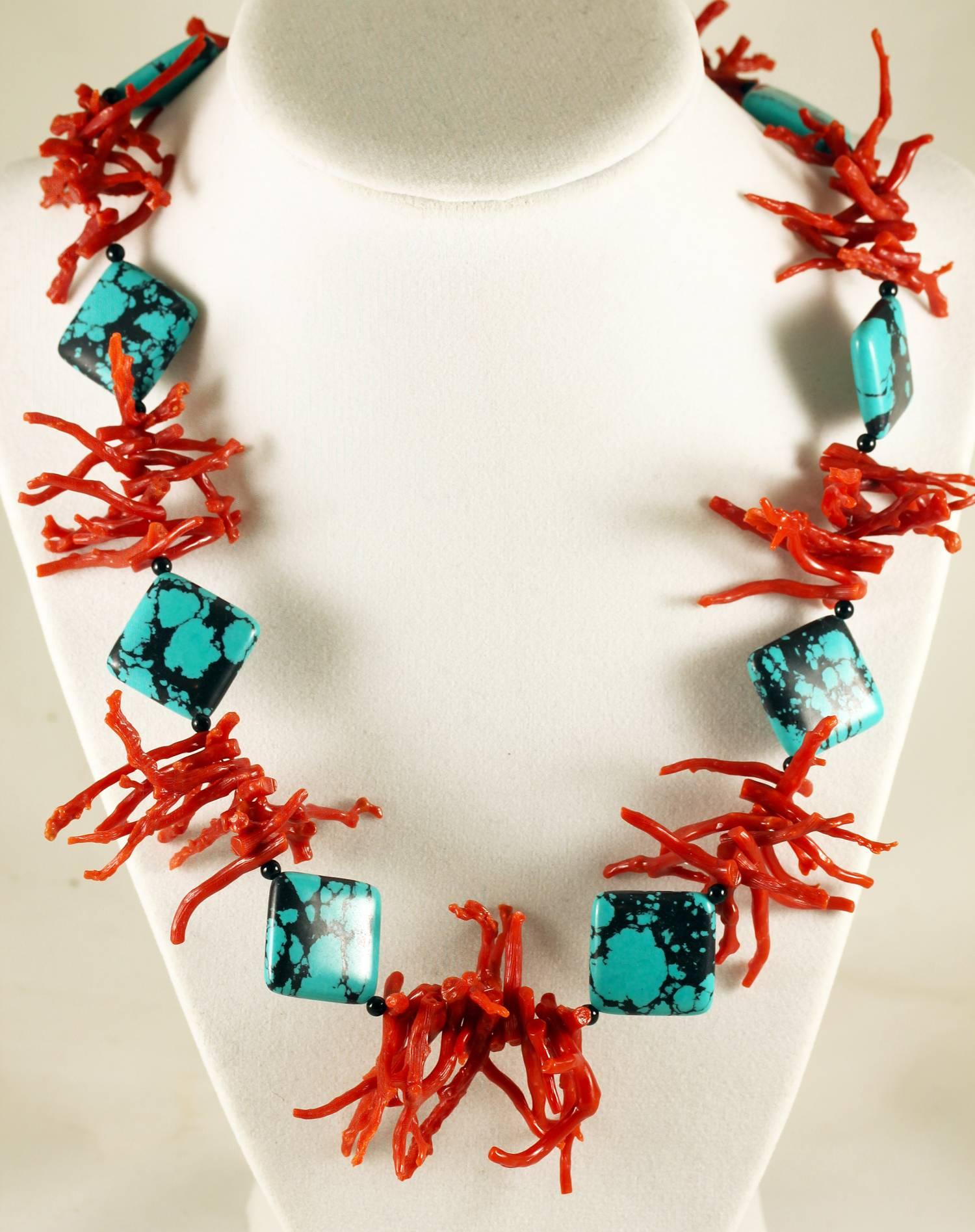 Single strand of fine natural very rare delicate red Coral branches enhance this deep sky blue Arizona Turquoise accented with black Onyx.  The necklace is comfortable 20 inches and the coral branches are approximately 20mm.  The clasp is silver