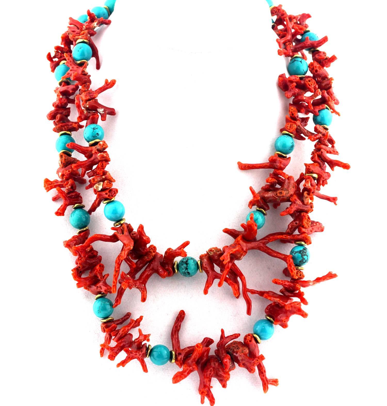 This is a Double strand choker length (16inches) necklace of unique lacy red/orangy Coral branches.  The Coral branches, which are up to 1.5 inches long, are enhanced with faux polished turquoise gems  (Magnesite Turquoise) and gold tone accents on
