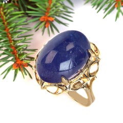 AJD Terrific Tanzanite 27Ct Oval Cabochon in 14K Yellow Gold Ring