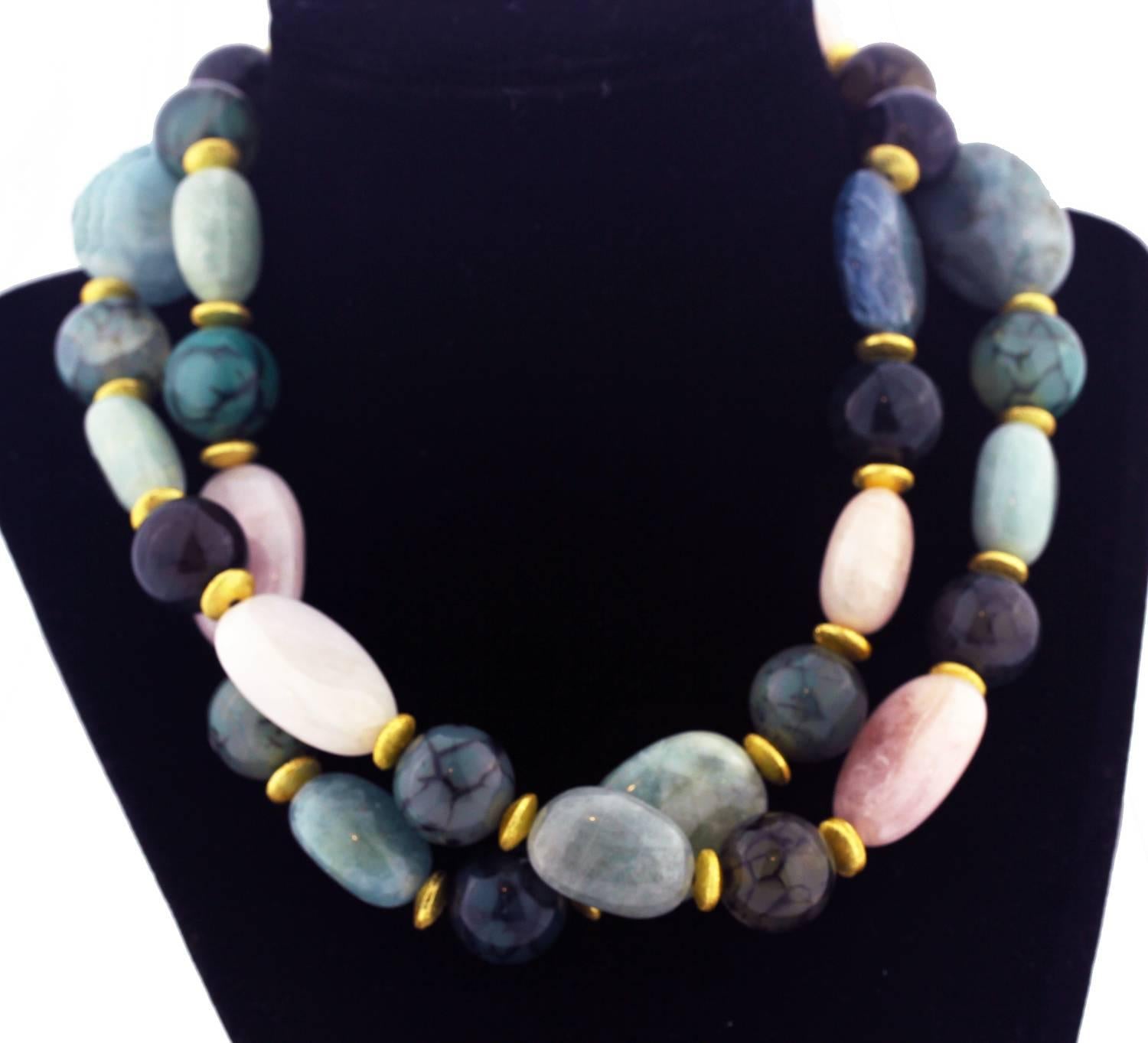Double strand necklace of Aquamarines, green Beryls, Morganites, and Spider Web Jasper.  The gemstones are all opaque, tumbled, and highly polished .  The color combination of pinks, blues, grays, and greens  is very pleasing and is enhanced with