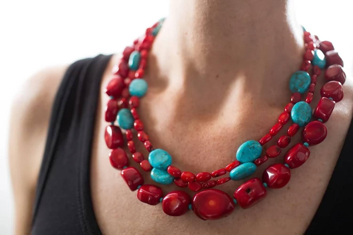 Wow!  This is a great Southwest look Necklace.  Wear this casually with jeans.  This handmade necklace will just as easily go out in the evening for cocktails and dinner.  Triple (3) strand natural highly polished red Coral enhanced with Magnesite
