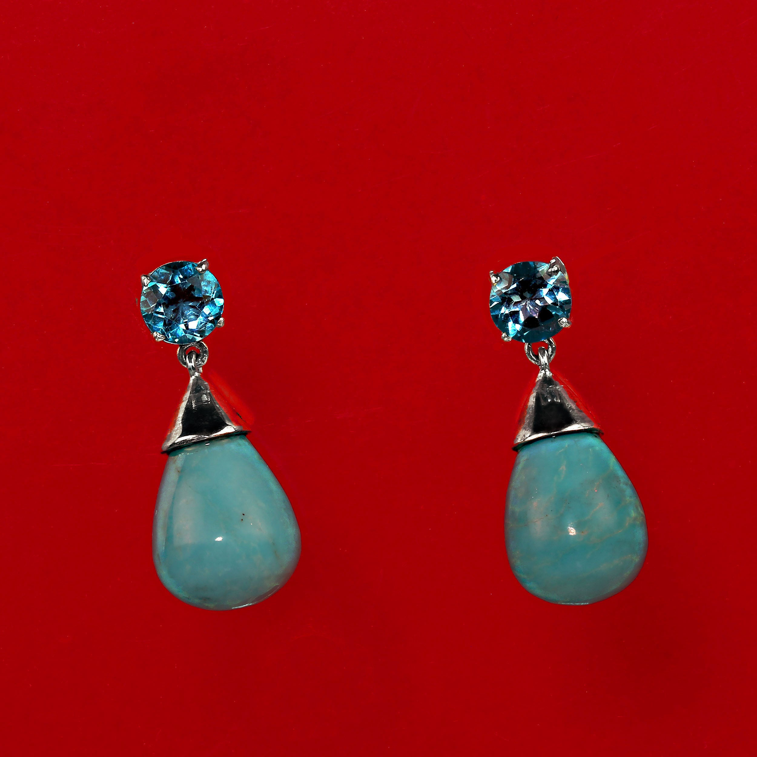 Exquisite Sleeping Beauty Turquoise Briolette & Apatite Earrings in Sterling Silver
Add a touch of rare elegance to your collection with these stunning Sleeping Beauty Turquoise briolette drop earrings, perfectly complemented by sparkling round
