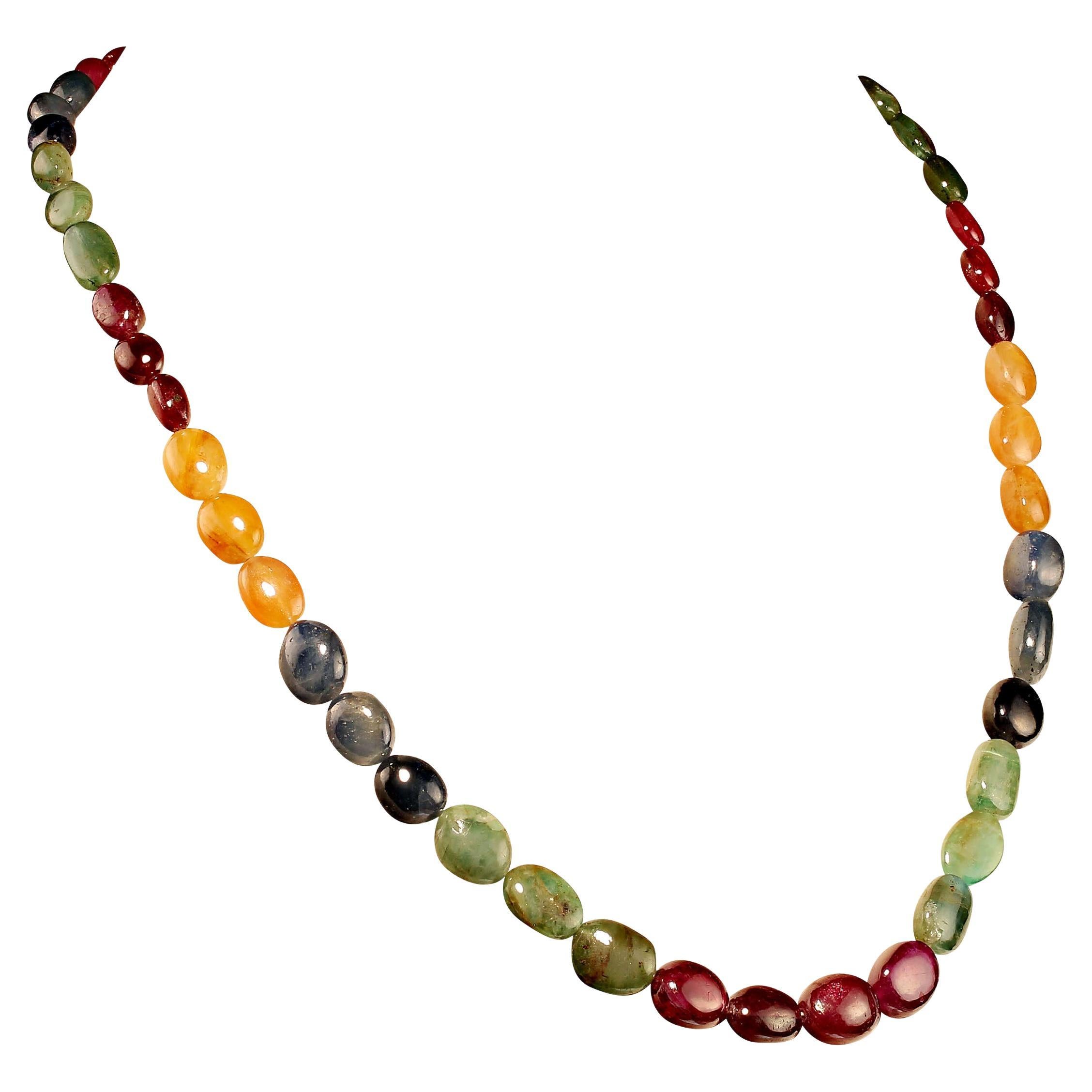 Bright and fun smooth ovals of graduated Sapphires are just perfect for that finishing touch.  This Sapphire necklace is a lovely way to enhance every ensemble.  It is 19 inches of gemstones in green, blue, yellow, and pink/red.  They graduate from