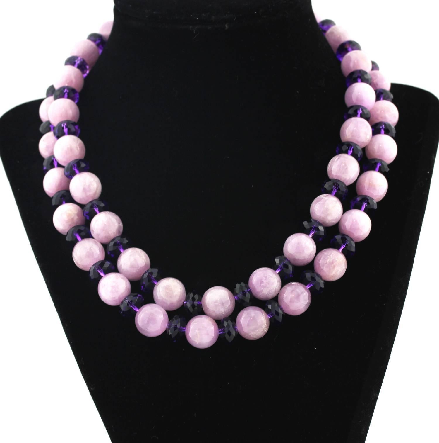Gemjunky Double strand of natural unique glowing polished round translucent Kunzite rocks enhanced with gemcut sparkling Amethysts compose this handmade necklace.  Size:  Kunzites approximately 12.5 mm;  Length:  16 inches;  Clasp:  silver tone.  