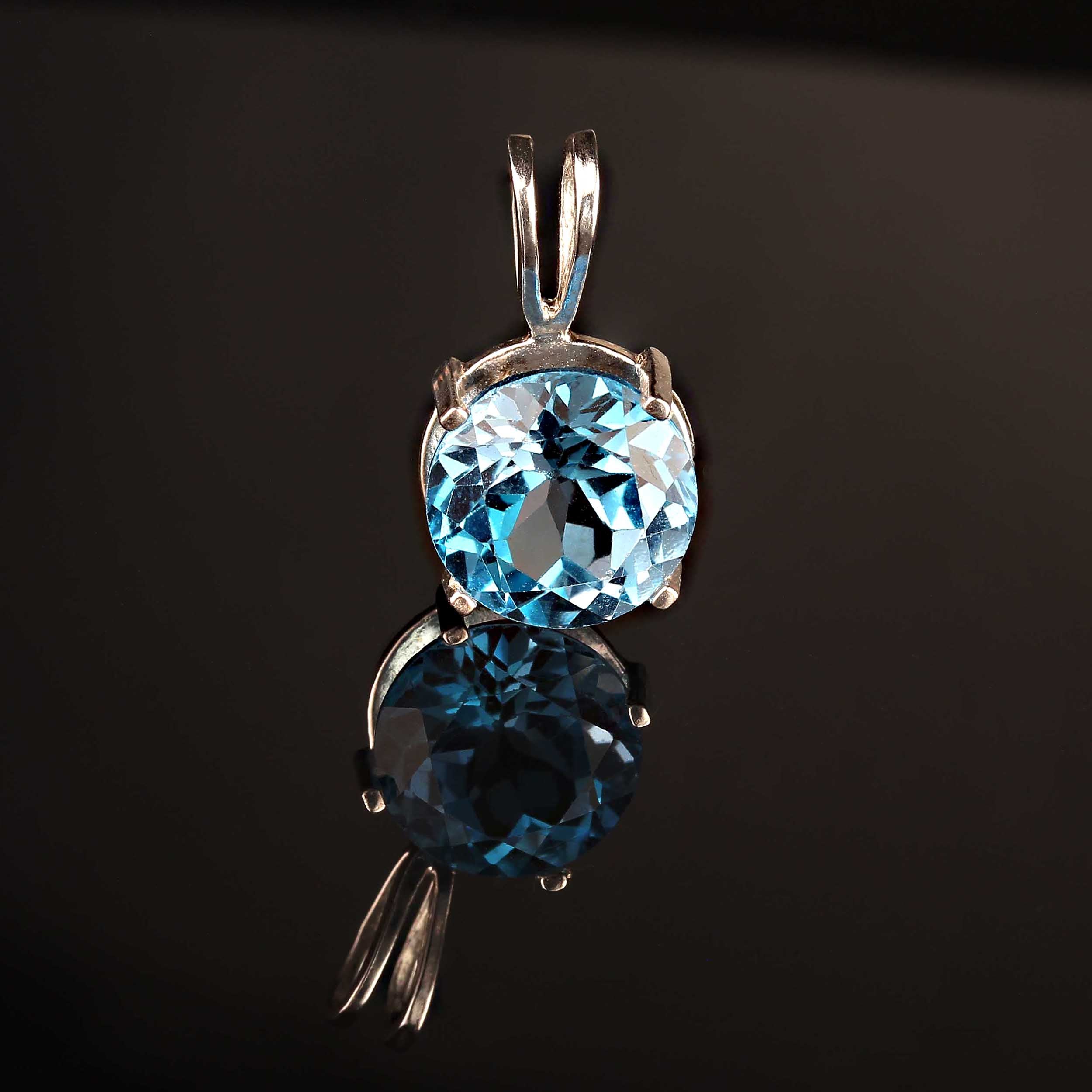 AJD Sparkling Swiss Blue Topaz and Sterling Silver Pendant For Sale