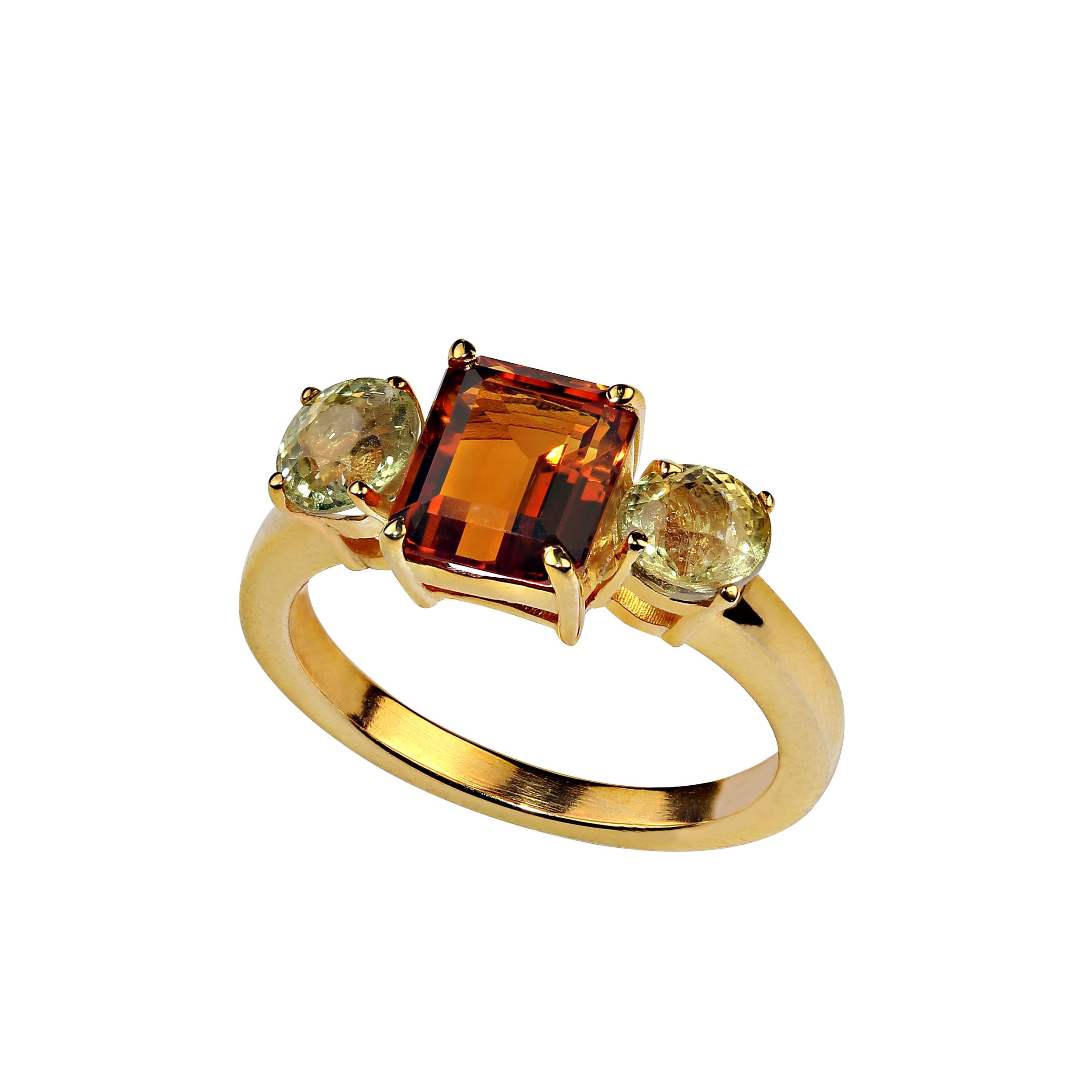 Classic 3 Stone Ring featuring gorgeous Citrine and rare, unusal Mali green Garnets.  This unique ring won't be found anywhere else. The citrine is 2.23ct and the two garnets total 1.99cts.  The ring is gold rhodium over sterling silver.The ancient
