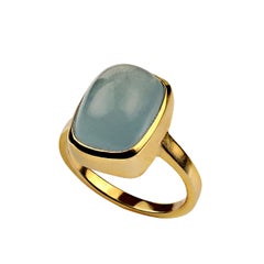 AJD 13ct Superbe bague aigue-marine cabochon en or rhodié avec lunette