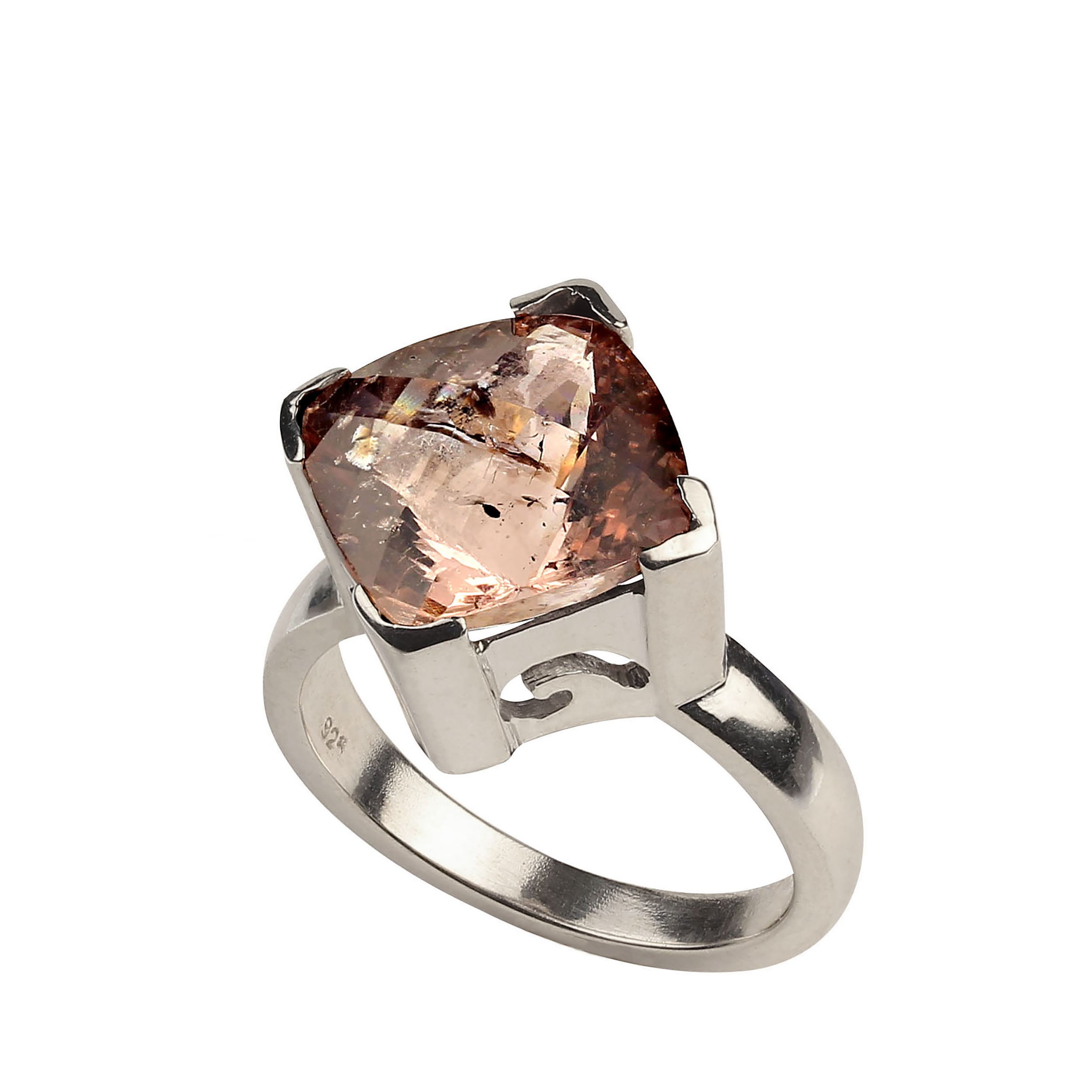 Introducing the 7.31ct Genuine Morganite Sterling Silver Ring – a breathtaking piece that captures the timeless beauty of this rare gemstone. Set in a beautifully detailed sterling silver band, the 7.31-carat antique cushion-cut morganite is