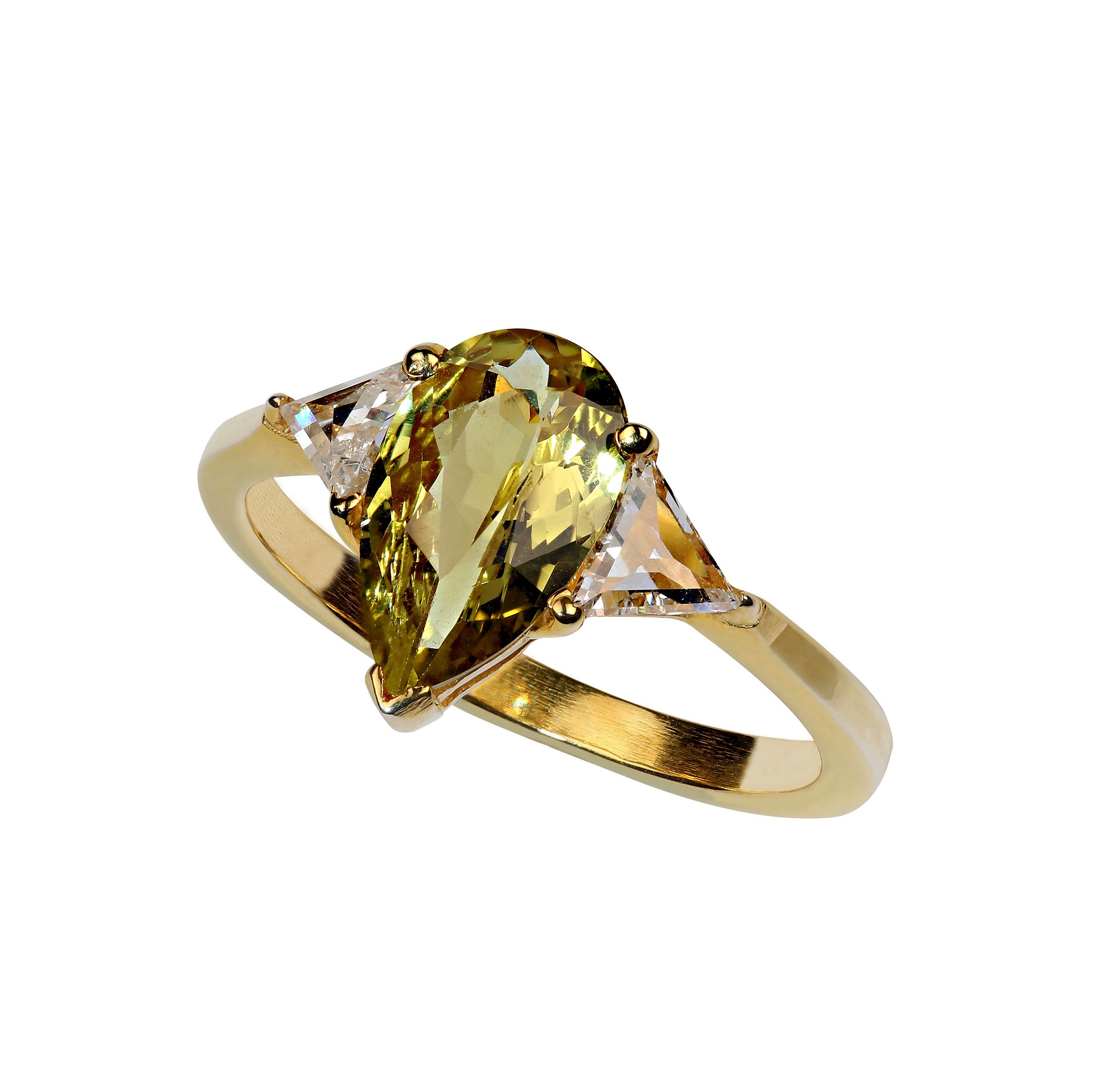 1.9Ct captivating Chrysoberyl in a lovely teardrop shape accented with two trianges of diamonds, total weight of 0.44cts. The lively yellowy gold Chrysoberyl comes from one of our favorite vendors in the mountains outside of Rio de Janeiro. These