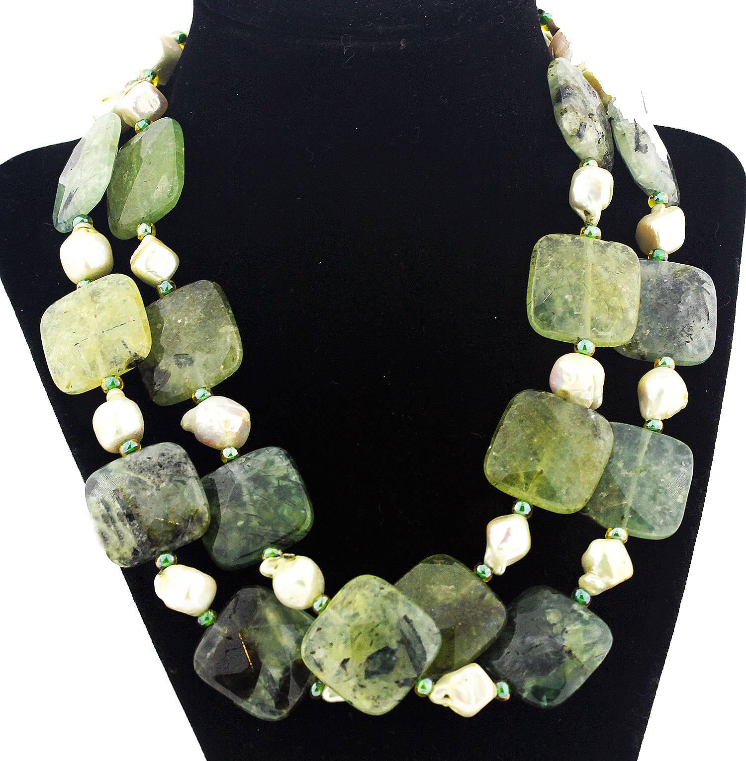 Gemjunky double strand of checkerboard gem cut unique natural Brasilian Prehnites with all the beauty marks natural to the stone.  They are enhanced by the chunky odd shaped white baroque Pearls in this handmade necklace.  Size:  Prehnite is