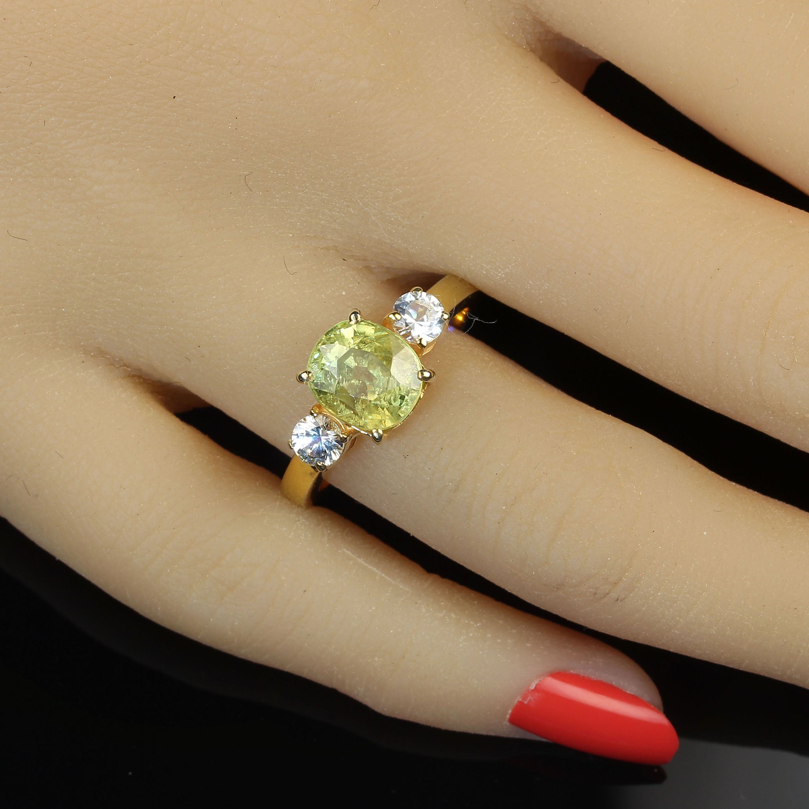 AJD Oval Sphene Accented with White Sapphires in Gold and Sterling Silver Ring