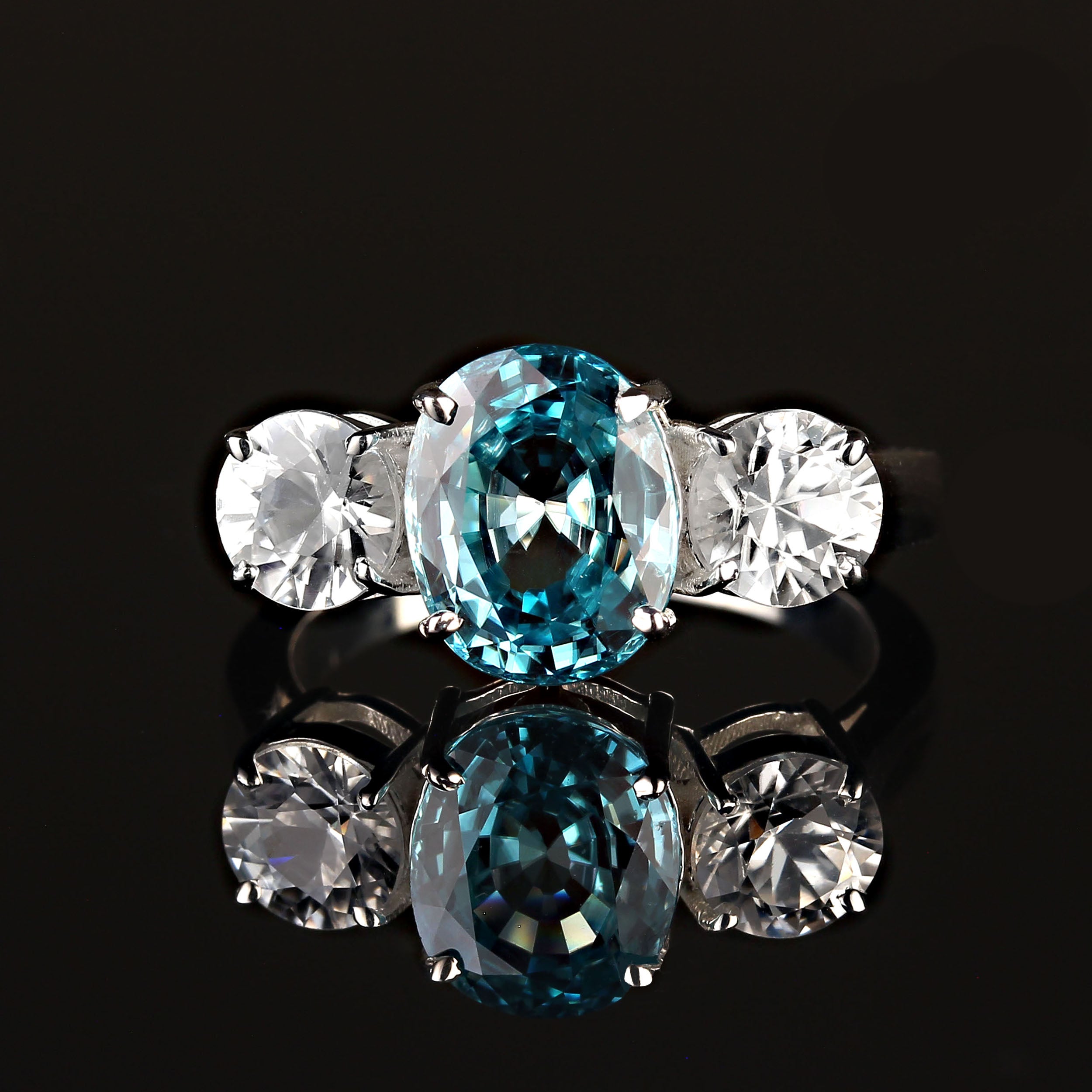 Aria Jewelry Design 4.25ct Oval Blue Zircon Three-Stone Ring in Silver