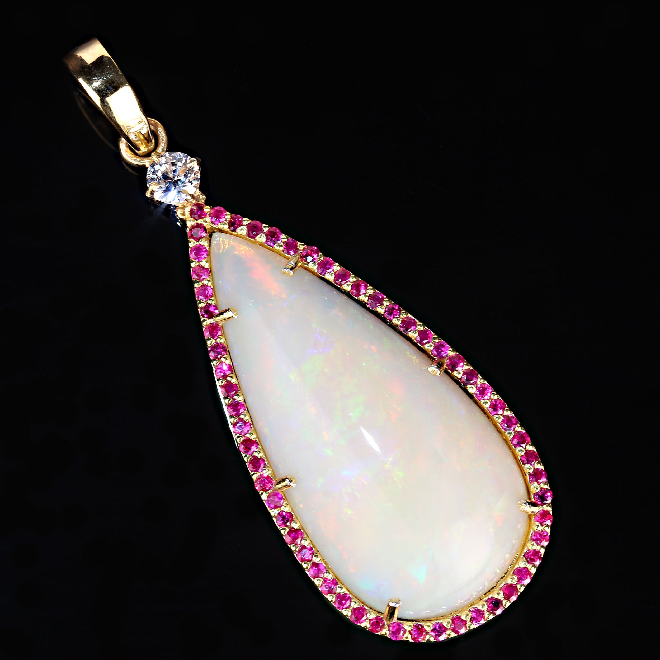 AJD Pendant of Magnificent Teardrop Opal Flashing Red & Green Surrounded by Ruby For Sale