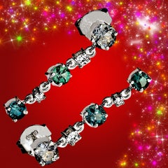 Orecchini a goccia in argento e tormalina blu AJD