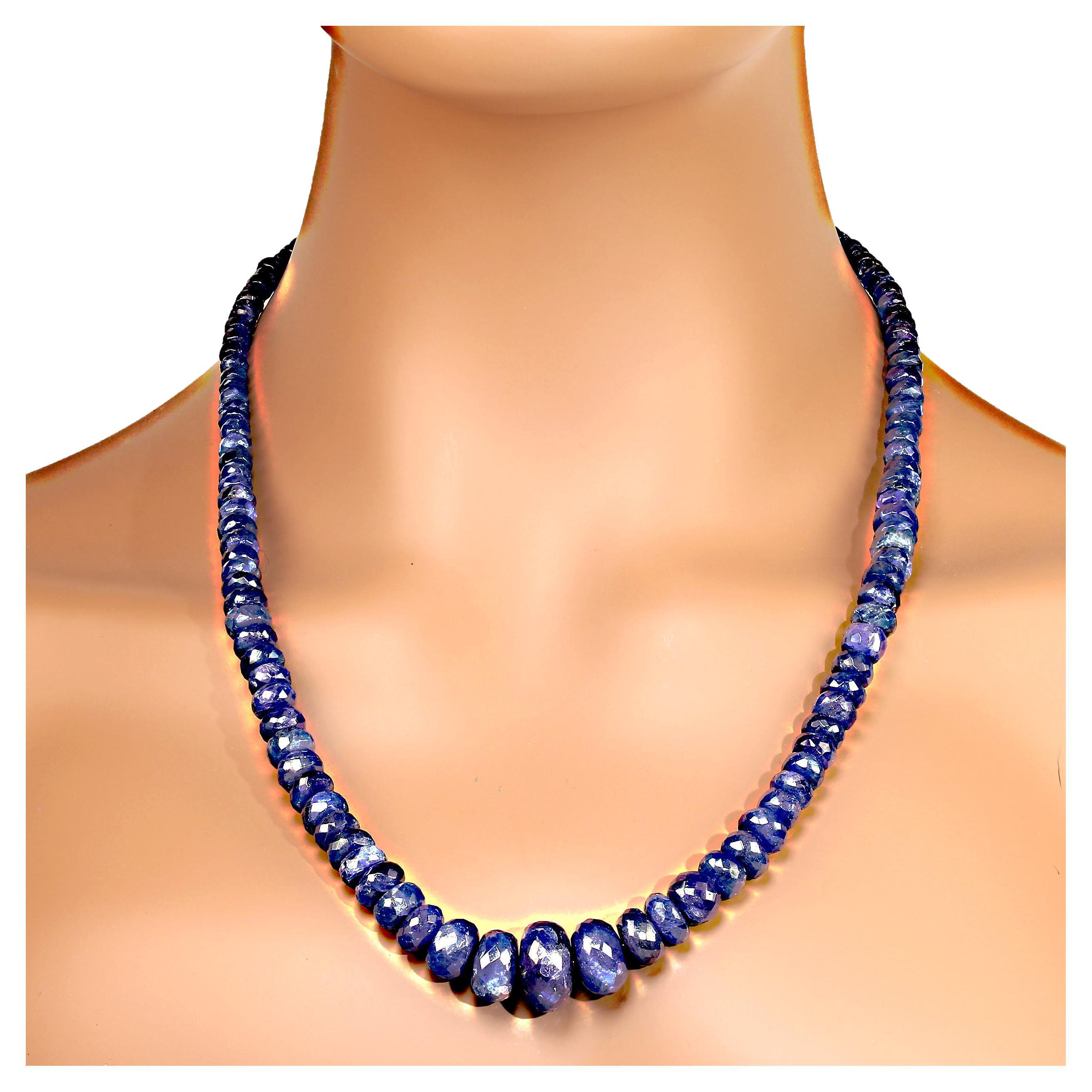 23 Inch translucent tanzanite necklace finished with lobster claw clasp with diamond chips. This lovely necklace is faceted graduated (5-17mm) rondelles of that distinctive tanzanite purpley blue color.  MN2360