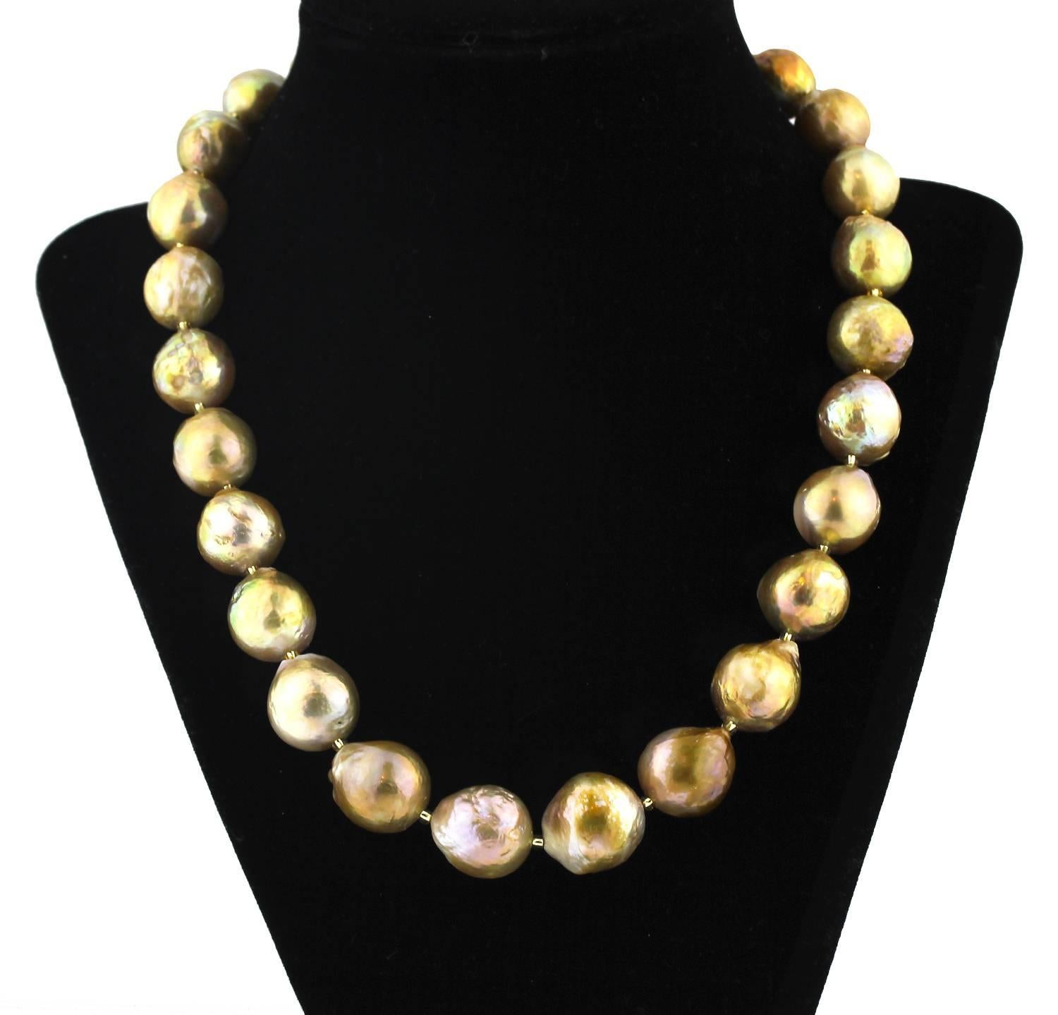 The natural unique and rare golden nacre from the Pearl shells is truly magnificent on these huge beauties on this handmade necklace..  Size:  graduated up to 17 mm;  Length:  18 inches;  Clasp:  gold plated. 