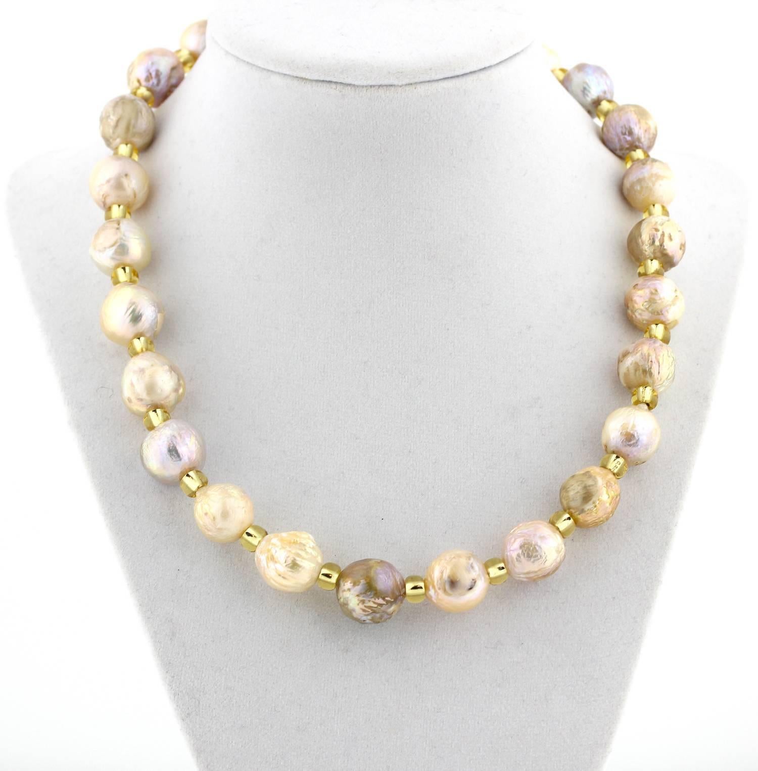 All of the unique natural nacre from the shells of the Ocean give these fun Pearls with all of their rough intense beauty an extraordinary glistening look - enhanced with sparkling gold tone crystals on this handmade necklace..  Size:  slightly