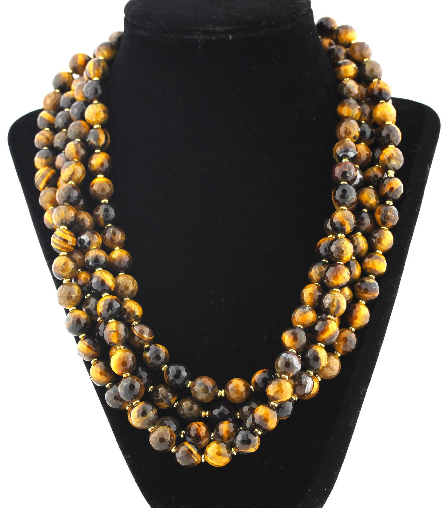 Beautifully checkerboard gemcut and polished sparkling Tiger Eye Necklace
Size:  10 mm
Length:  20.5 inches 
Strands:  4
Clasp:  gold tone
 