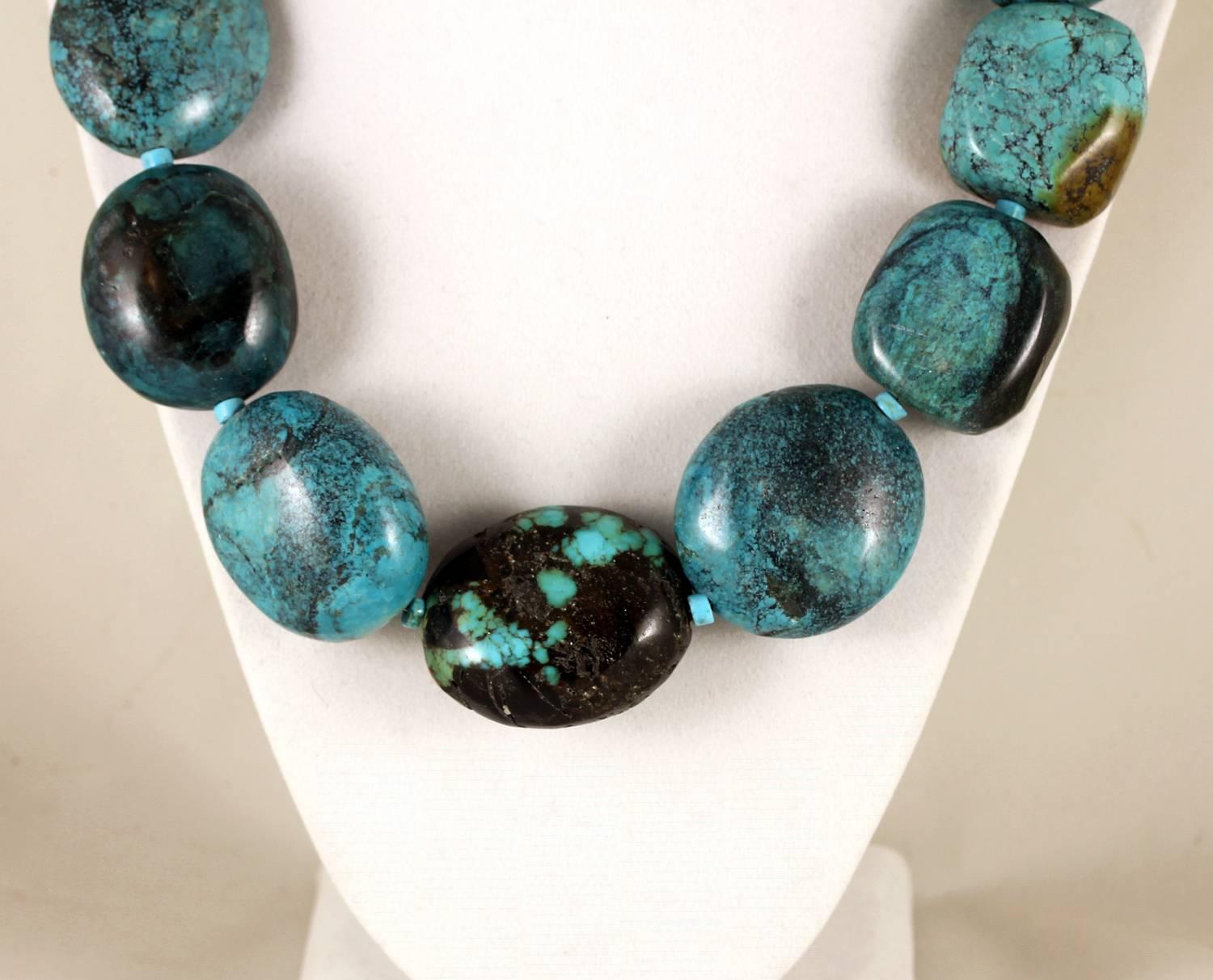 These are beautiful large highly polished almost ovals of natural Chinese Turquoise with polished American Sleeping Beauty Turquoise rondel accents unique handmade necklace.
Size:  varied sizes largest 36 mm x 31 mm approximately
Length:  20 inches;