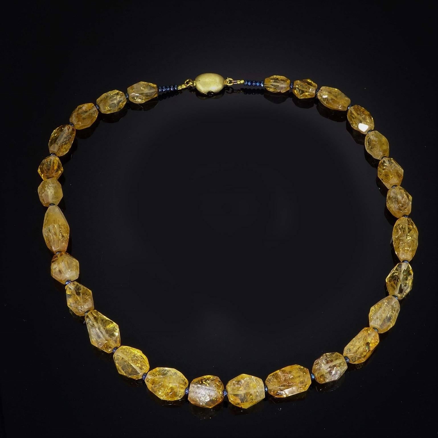 Polished Faceted Citrine Chunk Necklace.  Lots of Sparkle in this Golden Honey colored Necklace, the citrines vary in size 10-22mm. These Citrines have all the natural inclusions typical of this type of gemstone. Faceted teal spacers enhance the