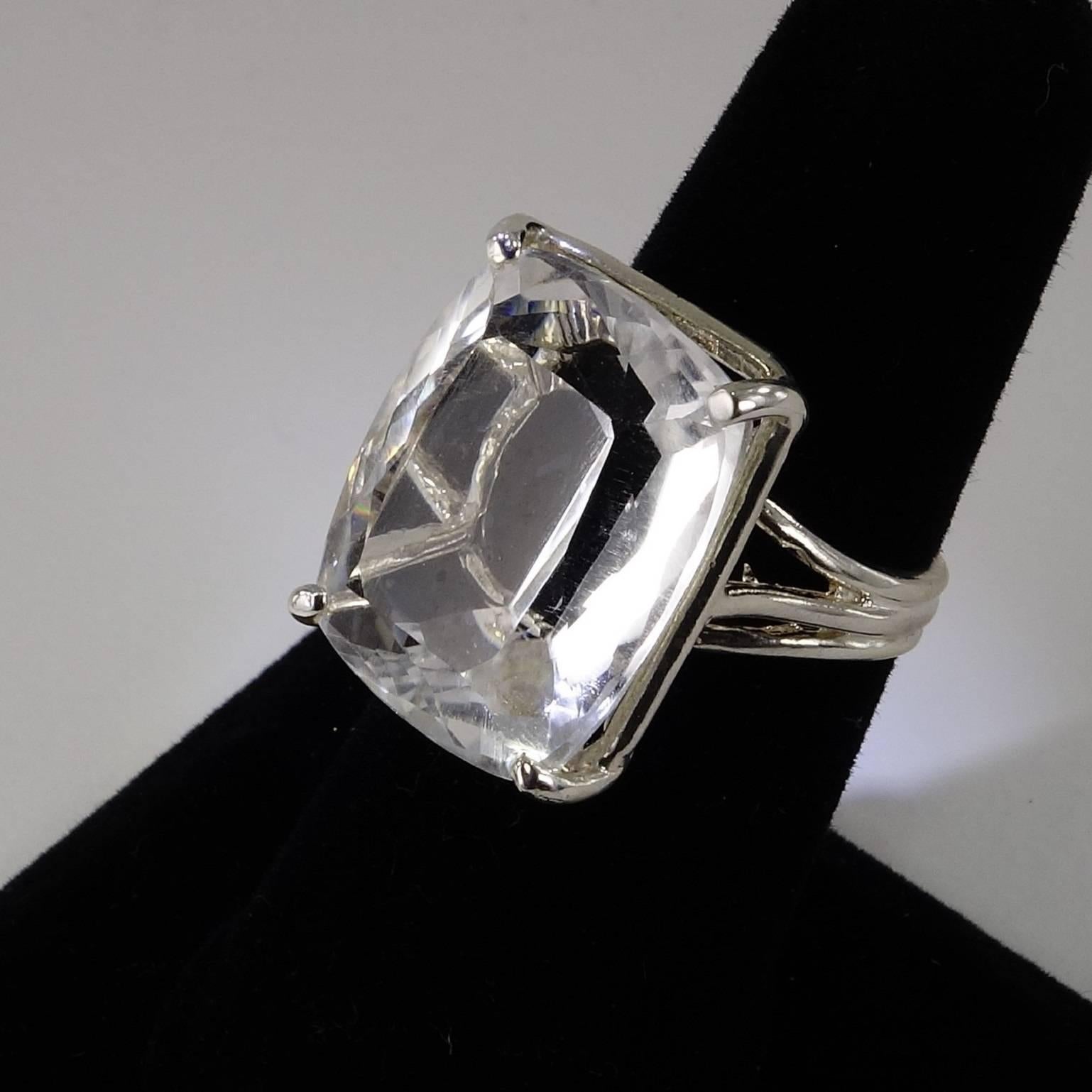 Sparkling Silver Topaz, 21.32ct Cushion Cut makes a great fun statement ring in Sterling Silver.  Wear this out for Cocktails or out to Dance!  It's ready to go have fun. Size 8