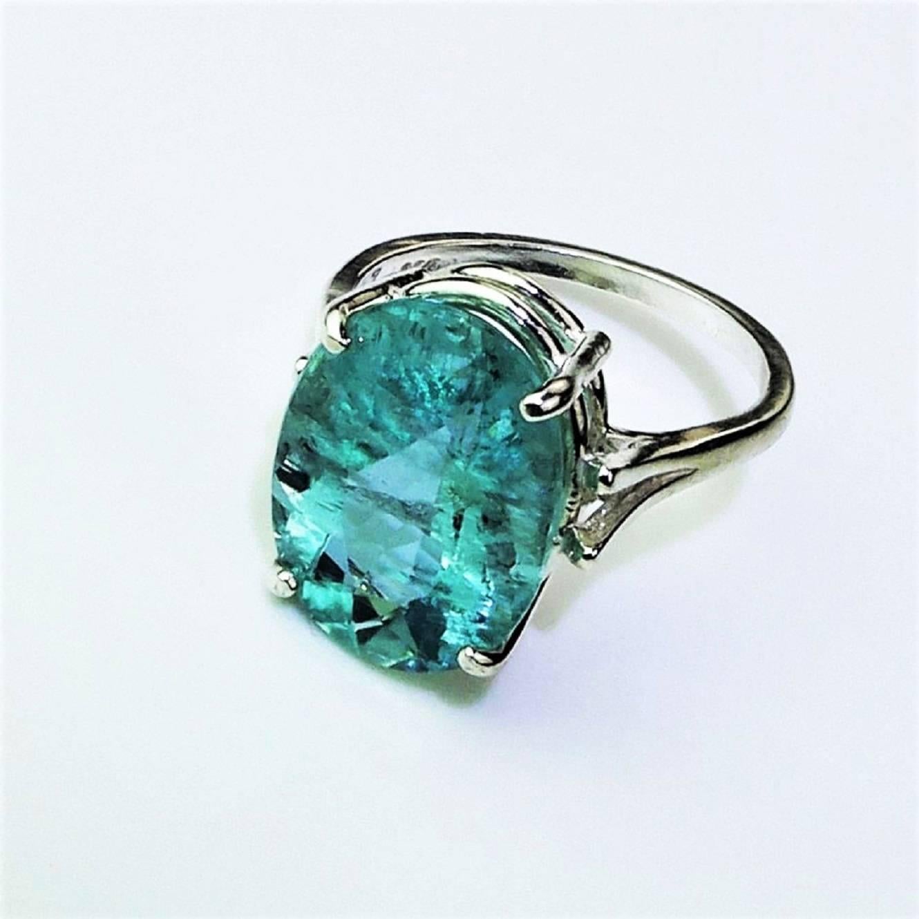 Sterling Silver and sparkling Blue with a touch of Green, the real 'aqua' color, Aquamarine,7.65ct, ring. This bright gemstone has all the delightful inclusions natural to aquamarines, many of which contribute to the sparkle. March's birthstone