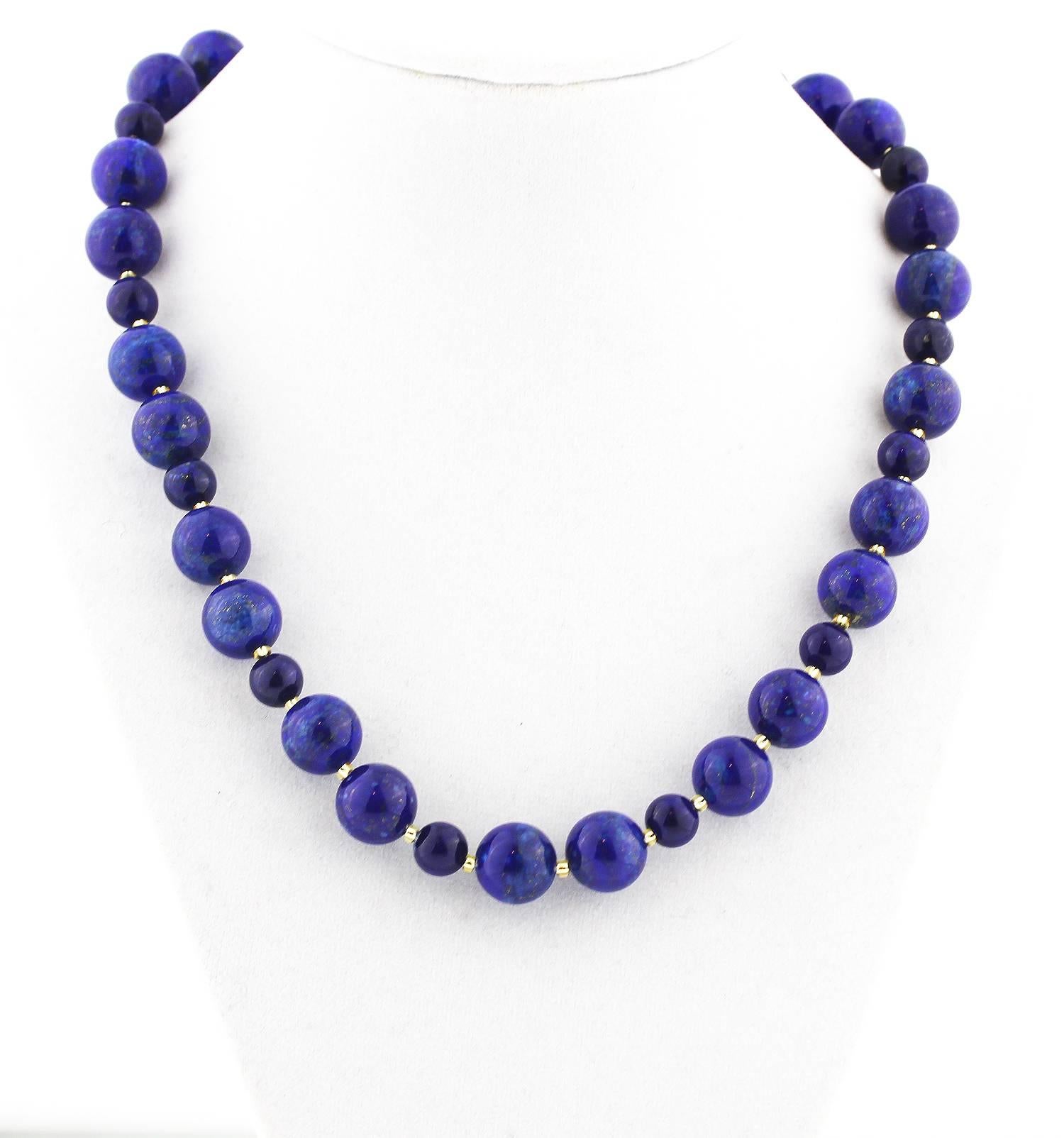 Natural highly polished glowing goldy flecked Afghan Lapis Lazuli Necklace
Size:  large ones 12 mm smaller ones 8 mm
Length:  18 inches
Clasp:  gold plated 