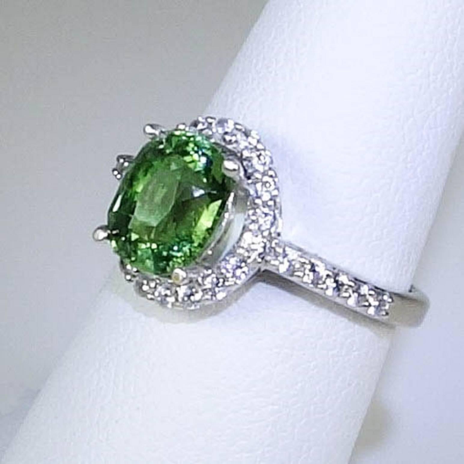 Oval Cut AJD Glowing Oval Green Tourmaline Halo Set in Sterling Silver For Sale