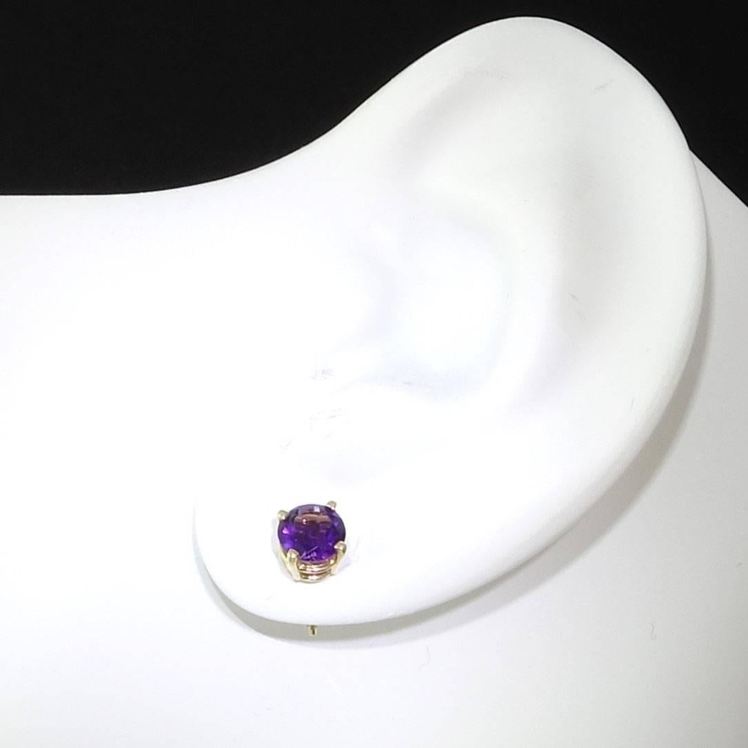 Sparkling, bright purple 5MM round Amethyst  and 14Kt Yellow Gold Stud earrings. Amethyst is February's birthday, this is the perfect birthday gift. Perfect gift for any time.  Amethysts are 5mm.
