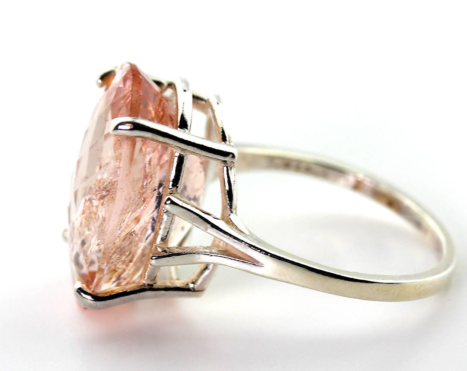 This unique beautiful highly sparkling checkerboard cut 11.24 Carat natural Brasilian Morganite is 13 mm x 17.3 mm set in a handmade sterling silver.  The ring is a sizable 7.  More from this seller by putting gemjunky into 1stdibs search bar.