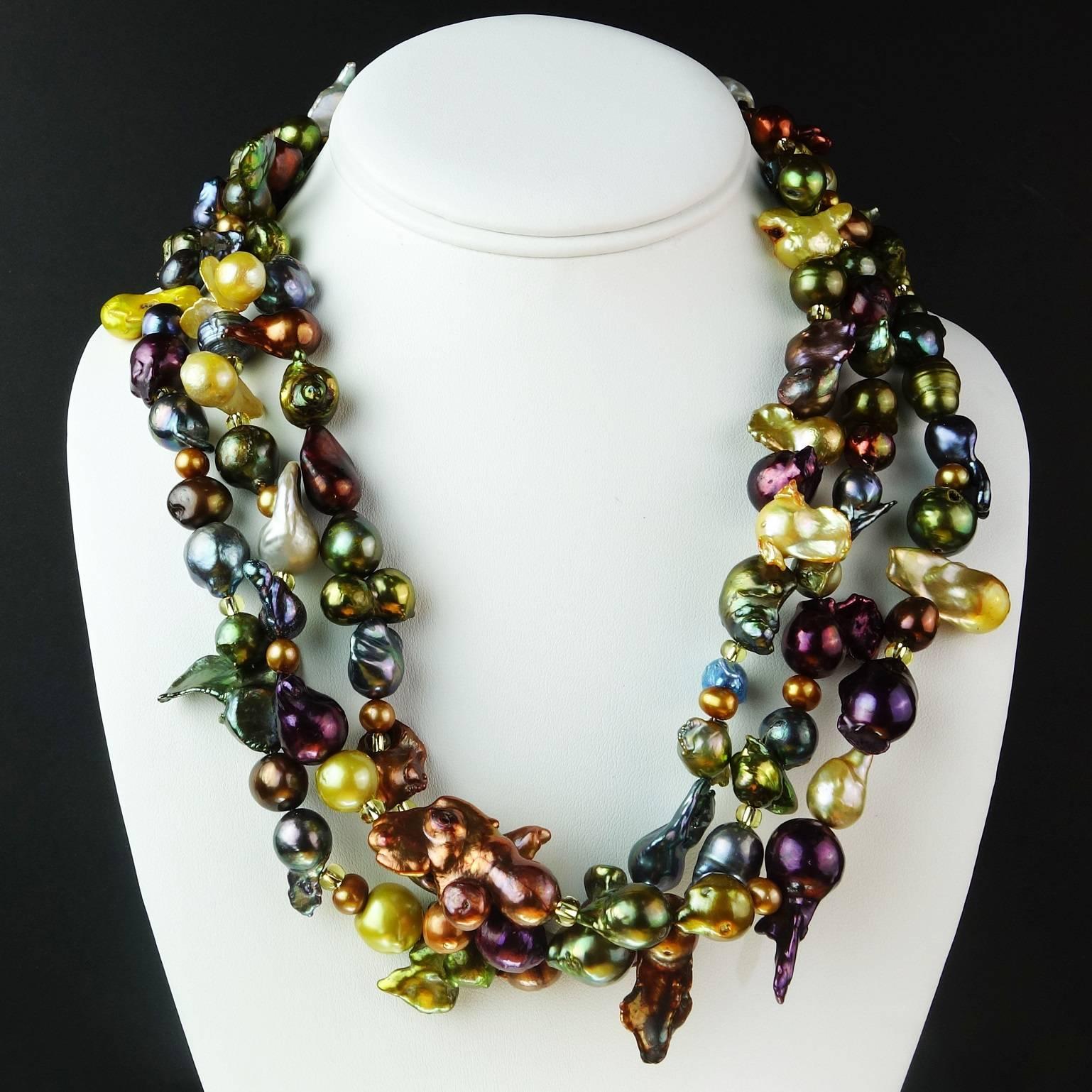 Multi shape, multi color, multi size Pearls in a custom made three strand necklace that will knock your socks off! This jewel tone necklace is so much fun you will want to wear it every day. Every pearl is a delight.  There are gold Czech beads