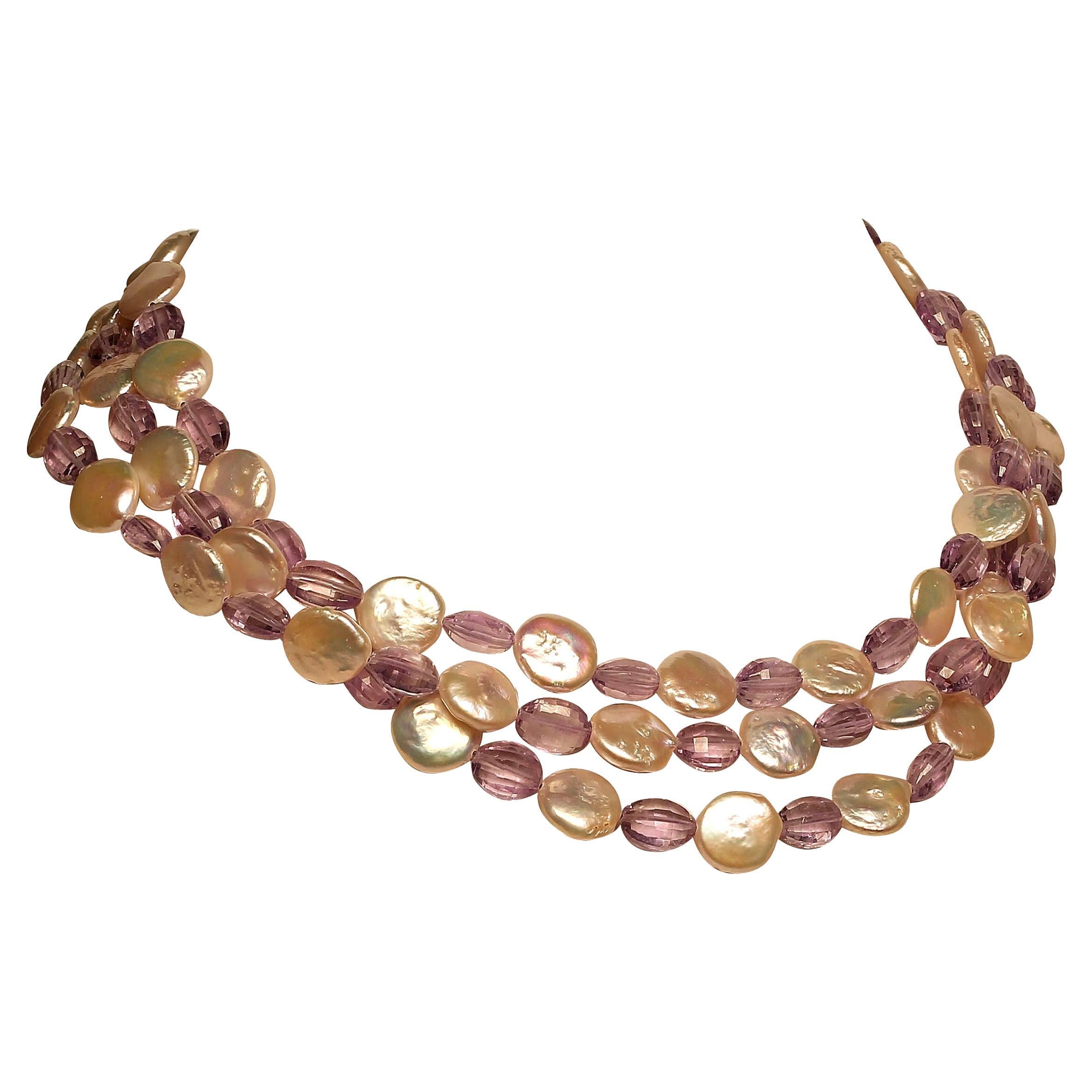 Own the jewelry you wish for

Custom made necklace of lovely iridescent white Coin Pearls alternating with sparkling faceted barrel shaped lilac Amethyst. These beautifully cut Amethyst are perfectly paired with the glowing white pearls. This unique