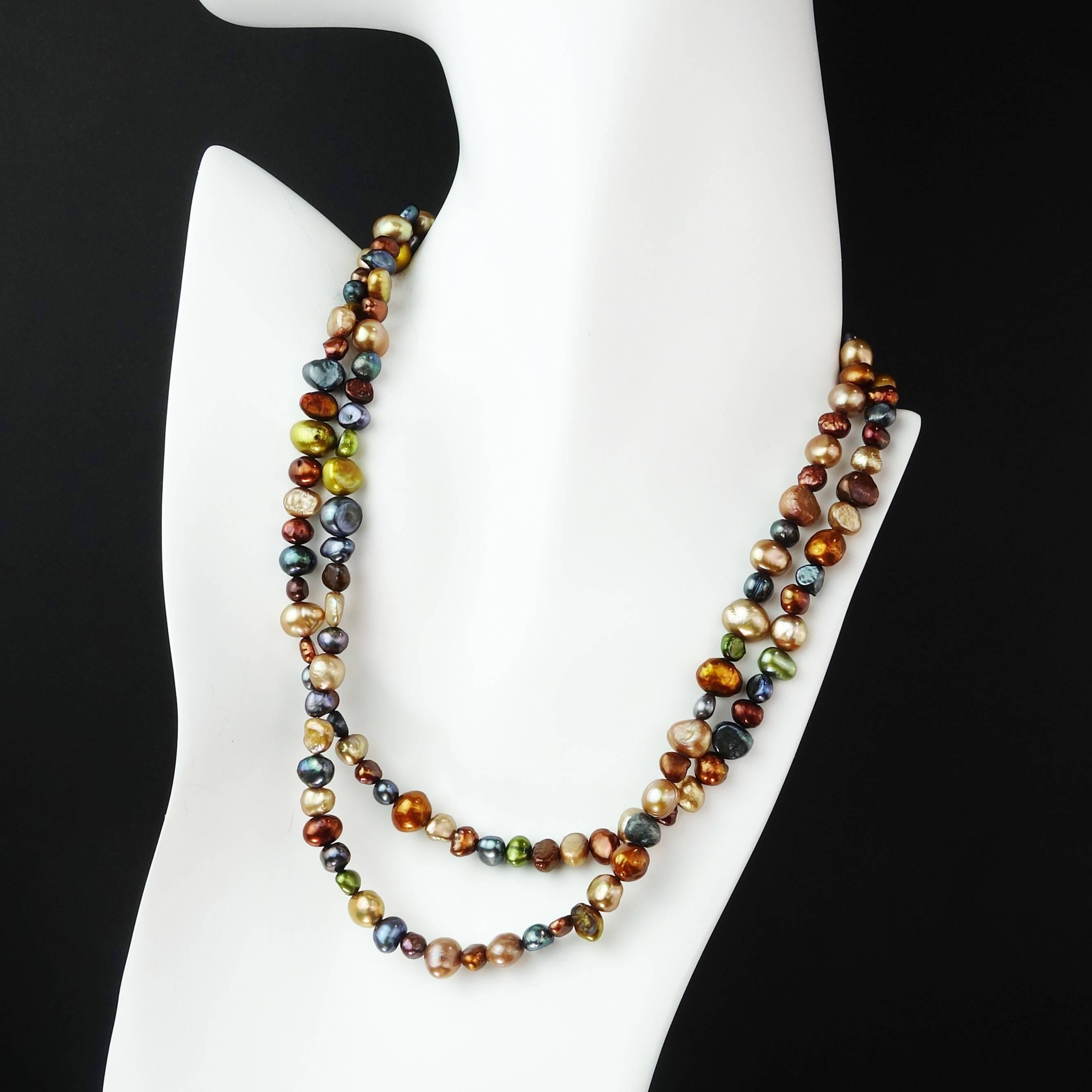 34 Inch Necklace of Deep Jewel tone freshwater Pearls.  This necklace features gold, red, blue, rust, green, gray, and aubergine Freshwater Pearls. The pearls are approximately 3-8mm in size.  At 34 inches it could be wrapped twice. This necklace