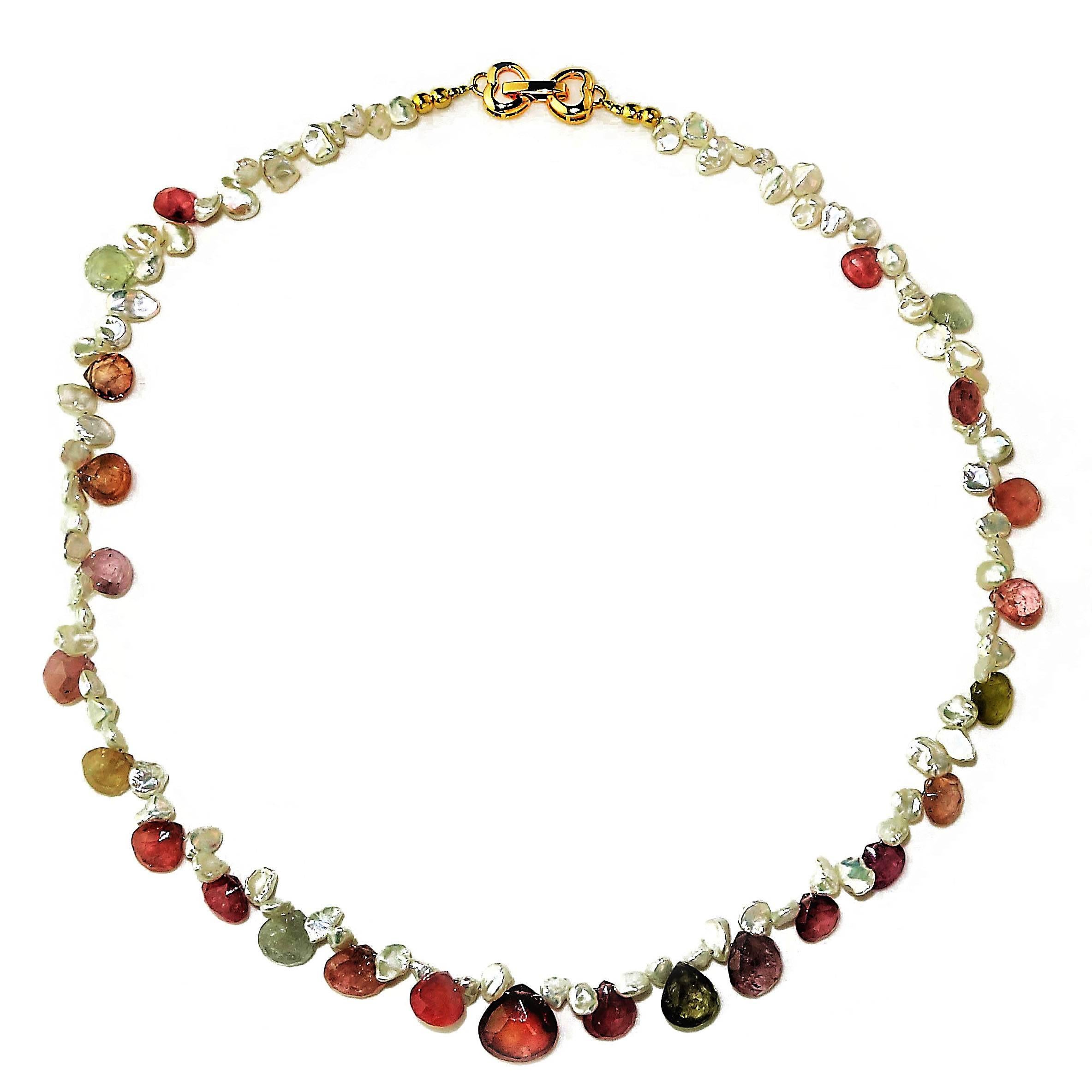 Custom made 17 Inch Choker Necklace of Graduated fat Pear shaped Sapphire Briolettes and delicate freshwater white keshi pearls. The Sapphires are graduated from 6mm to 11mm and are in shades of pink, light green, and clear. They have all the