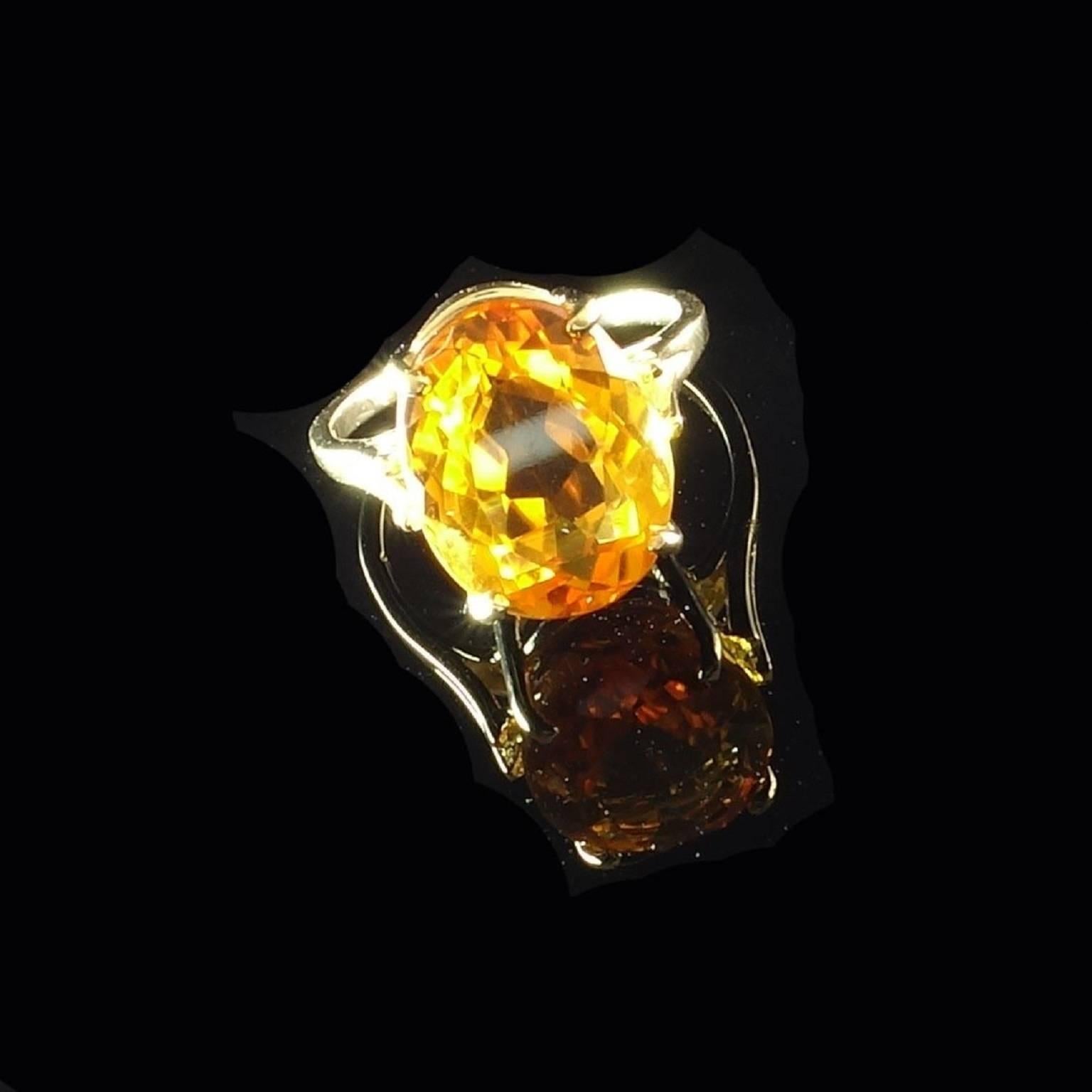 Sparkling, brilliant cut, oval Brazilian Citrine in Basket Style with Split shank setting ring of 14k yellow gold. This gorgeous Citrine comes straight from Brazil. We found it at one of our favorite suppliers in the mountains outside of Rio and