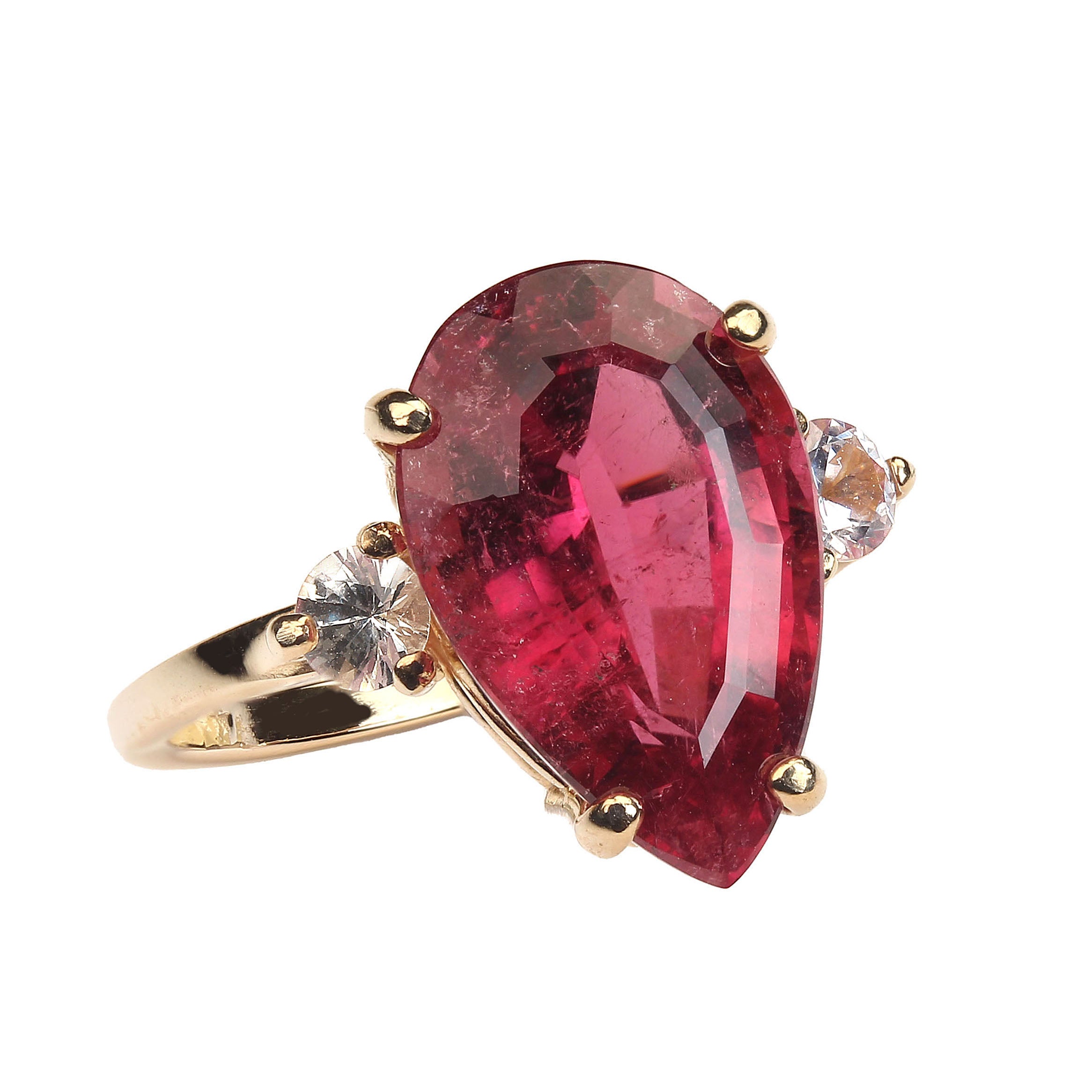 Sparkling, Brazilian Step cut Pear shape Rubelite accented with 2 White Sapphires set in rich 14K yellow gold.  The Rubelite is transparent but does have the typical rubelite inclusions which add to the sparkle. It is 4.5ct and is approx 14x9mm. 
