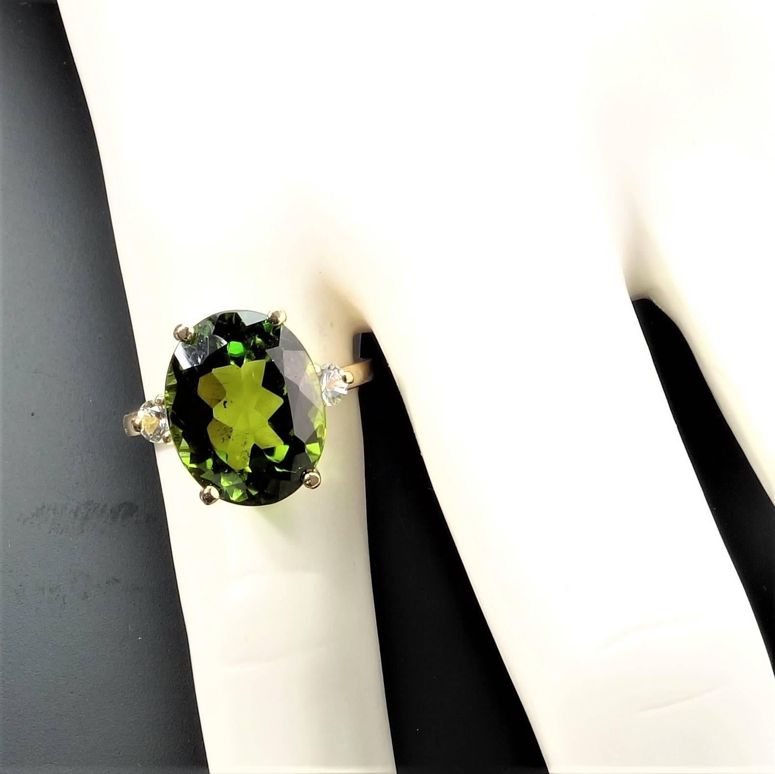 Oval Cut Oval Green Tourmaline with White Sapphires in Gold Ring