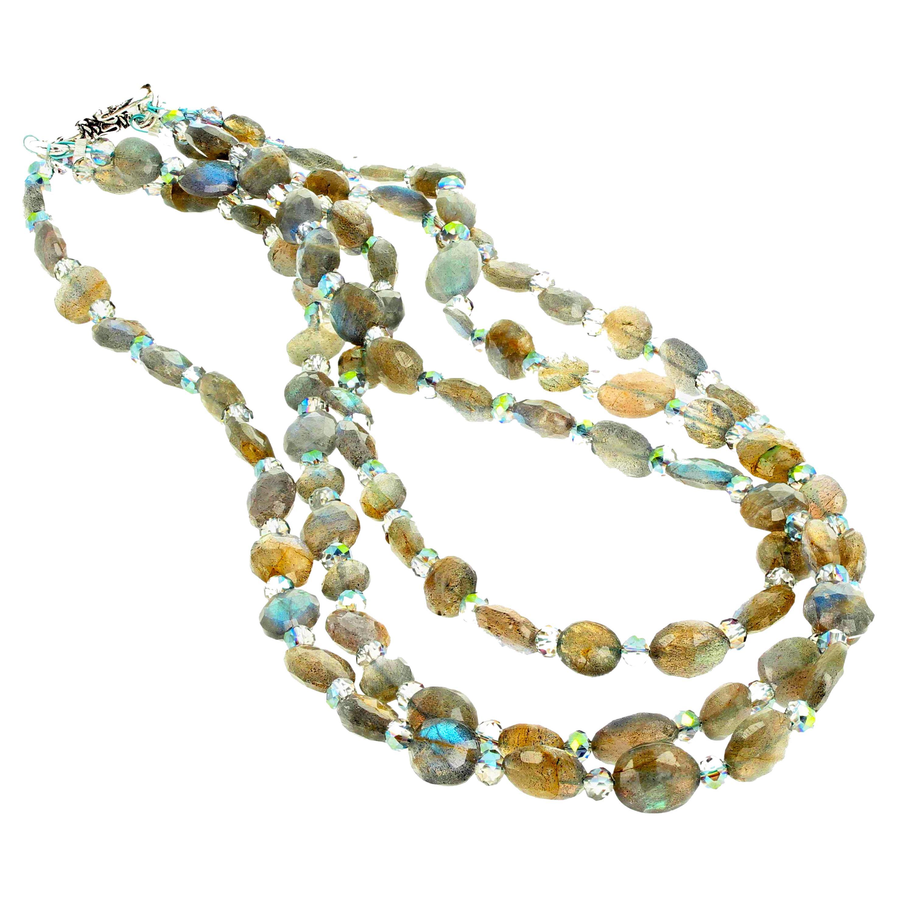 This glittering natural checkerboard gem cut polished Brazilian Labradorite tripple strand necklace is 15.5 inches long with a silver hook.  The average Labradorite is approximately 10 mm x 8 mm.  The gemstones glisten and glitter reflecting all