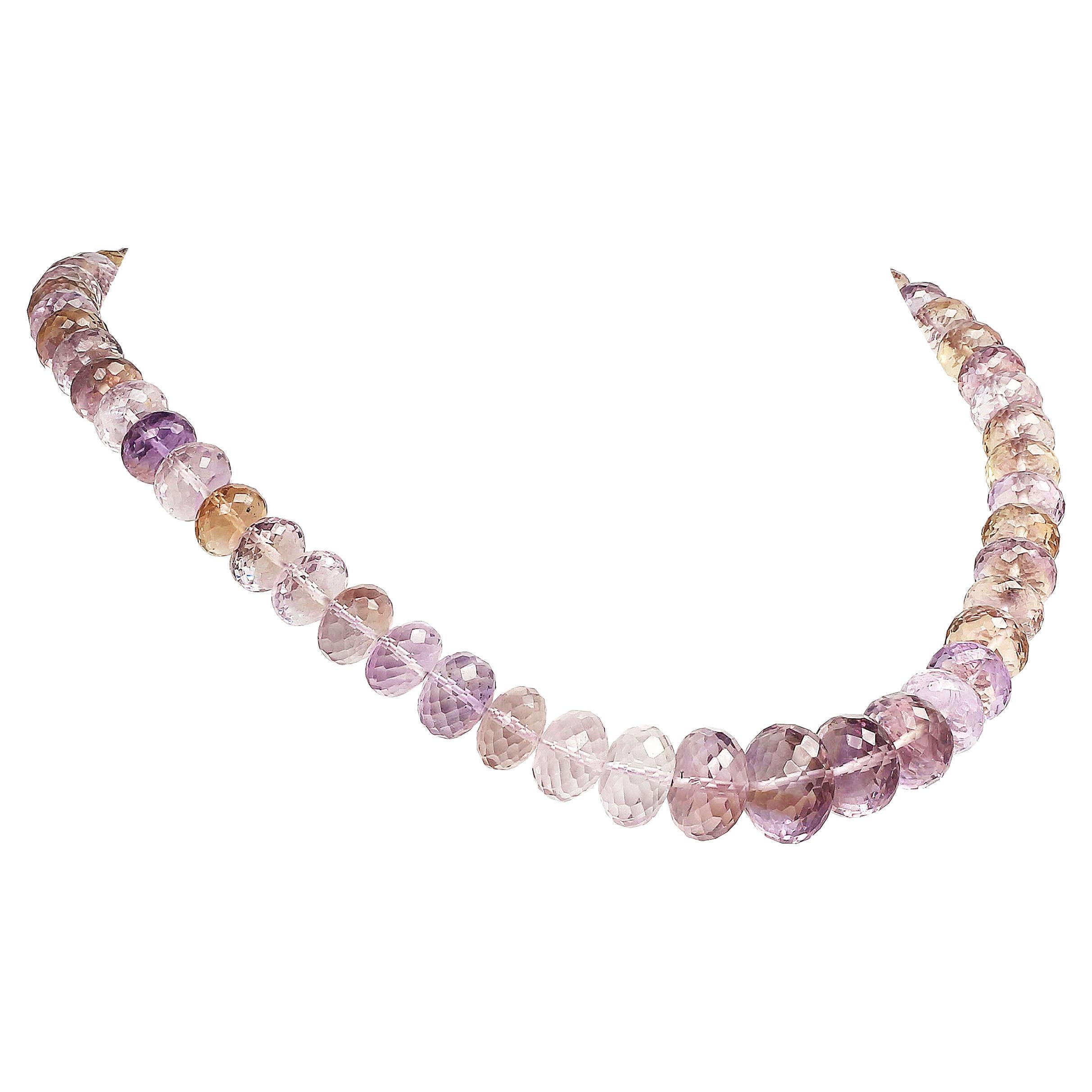 Unique, handmade necklace of glittering Rose of France rondelles.  This sparkling necklace will light up your life!  Each rondelle on this graduated necklace is multifaceted to return a maximum amount of flashing light.  The rondelles graduate from