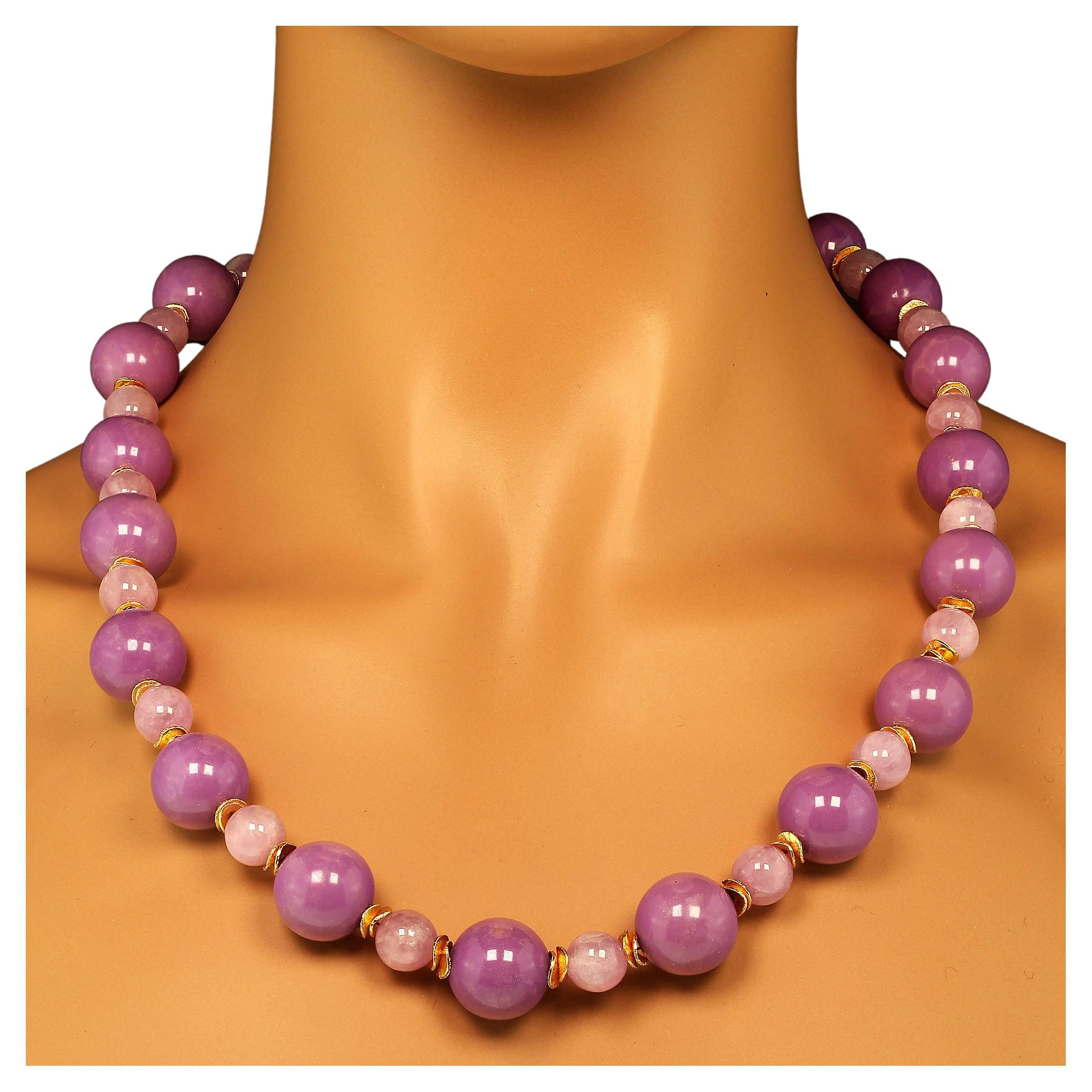 Unique mauve necklace of highly polished Phosphosiderite and Kunzite beads accented with goldtone flutters. The handmade 28 inch necklace is a marvel of color!  These two gemstones play off each other and create more than the sum of the parts.  The