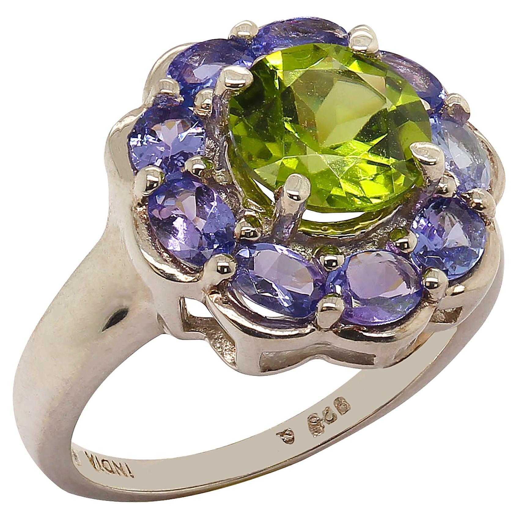 AJD Sparkling Ring of Green Peridot in Tanzanite Halo Sterling Silver