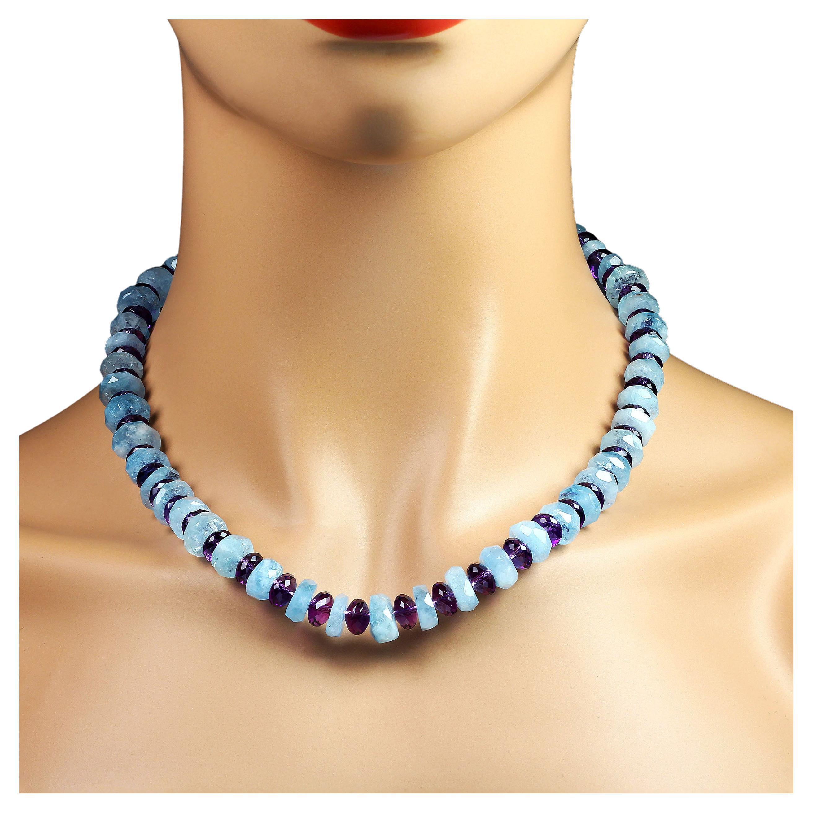 Handmade necklace of lovely medium blue graduated, 10-13 MM, translucent Aquamarine roughly faceted rondelles alternating with sparkling faceted Amethyst, 8 MM, and secured with a Sterling Silver hook. The blue Aquamarine and purple Amethyst play