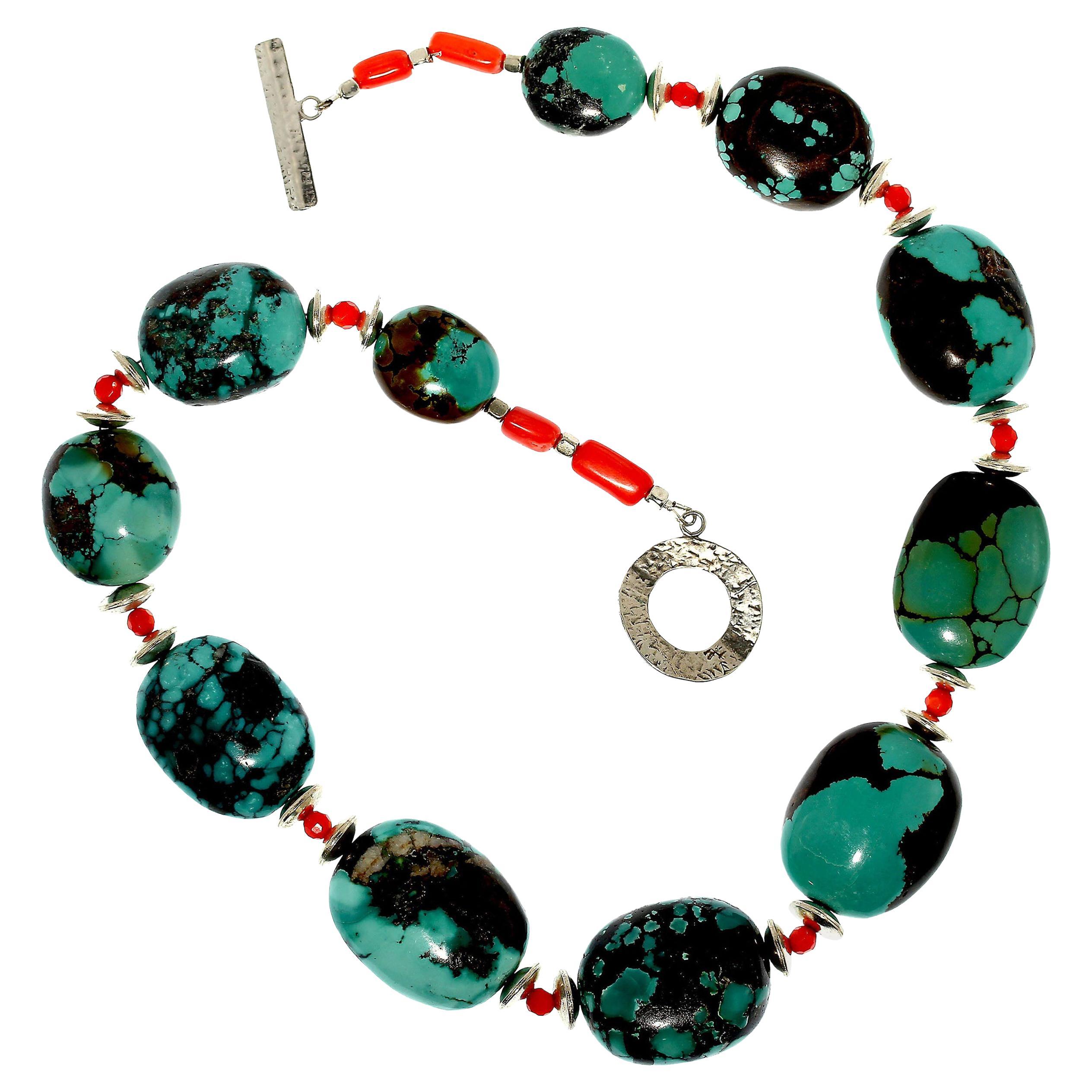 21 Inch Hubei turquoise nugget necklace featuring orange and silver accents.  This unique necklace begs to enhance your wardrobe. The touch of Southwest flair will go far to spice up the atmosphere wherever you find yourself.  There are eleven