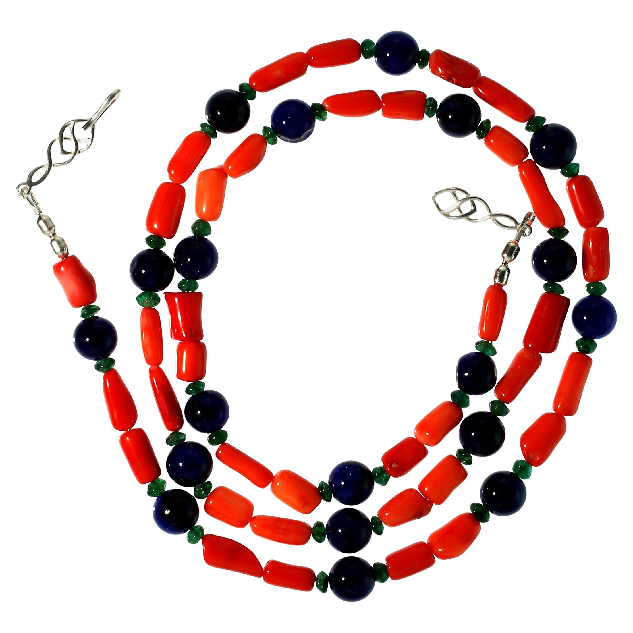 Bright orange tubes of coral mixed with highly polished bright navy blue jade, and green aventurine, make this long necklace a fun and funky wear with everything necklace to have in your wardrobe. The lovely blue jade is heat treated. At 33 inches
